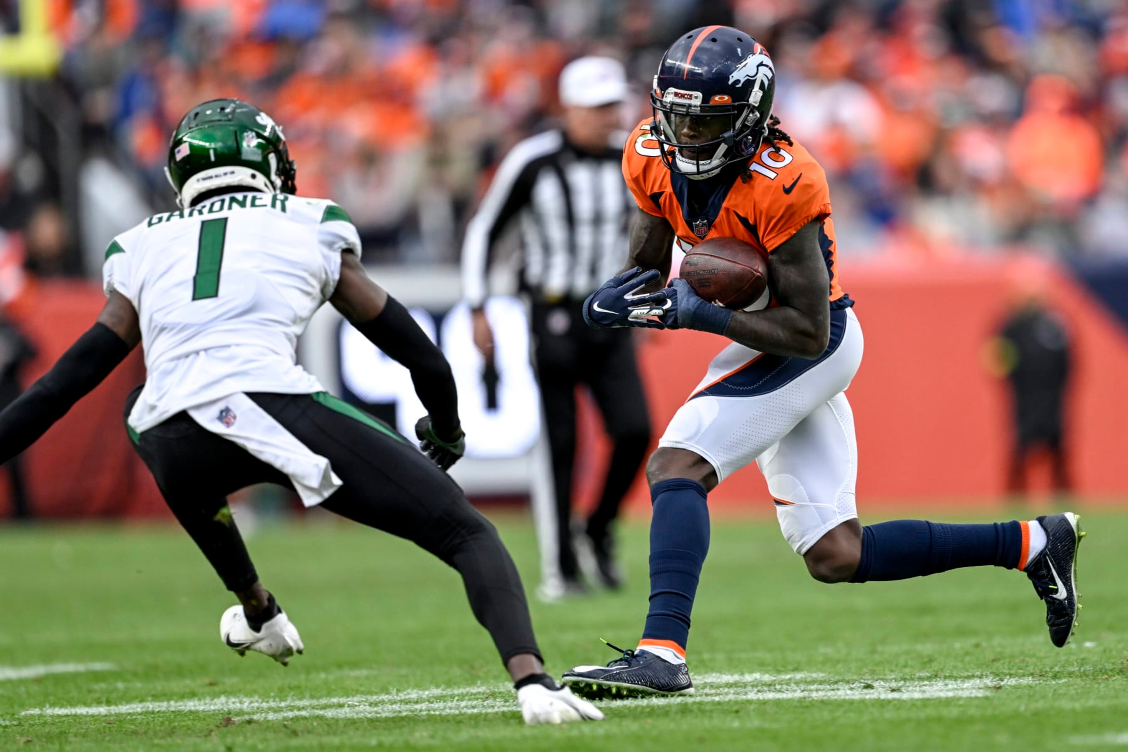DENVER, CO - OCTOBER 23: Jerry Jeudy (10) of the Denver Broncos runs after making a catch as Sauce Gardner (1) of the New York Jets pursues during the second half of New Yorks 16-9 win at Empower Field at Mile High in Denver on Sunday, October 23, 2022. (Photo by AAron Ontiveroz/MediaNews Group/The Denver Post via Getty Images)