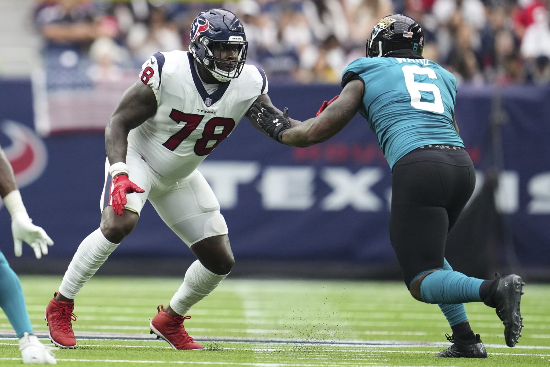 HOUSTON, TEXAS - SEPTEMBER 12: Laremy Tunsil #78 of the Houston Texans defends against the Jacksonville Jaguars during an NFL game at NRG Stadium on September 12, 2021 in Houston, Texas. (Photo by Cooper Neill/Getty Images)