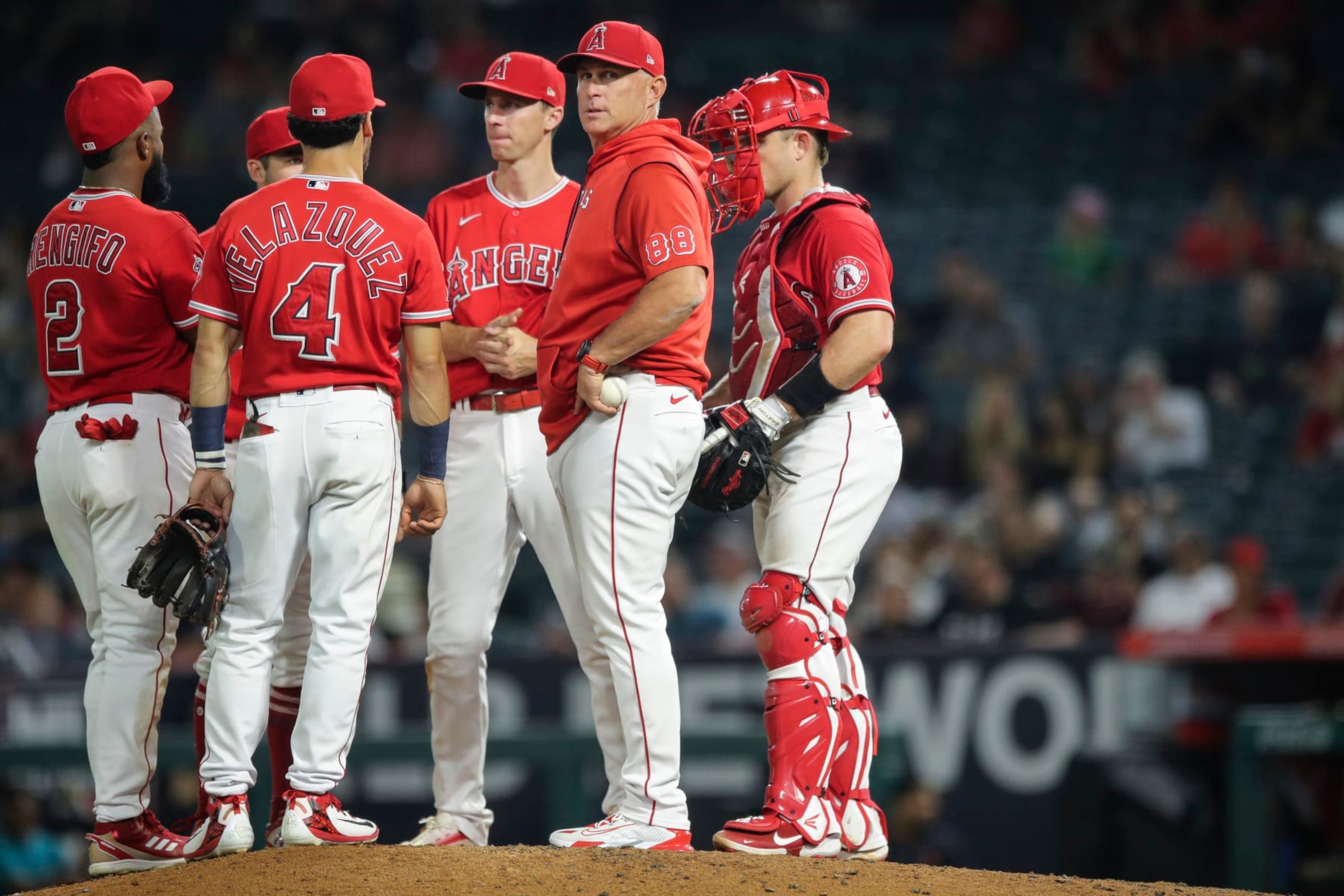 ANAHEIM, CALIFORNIA - SEPTEMBER 06: Los Angeles Angels manager Phil Nevin #88 meets with players on the mound in the eighth inning against the Detroit Tigers at Angel Stadium of Anaheim on September 06, 2022 in Anaheim, California. (Photo by Meg Oliphant/Getty Images)