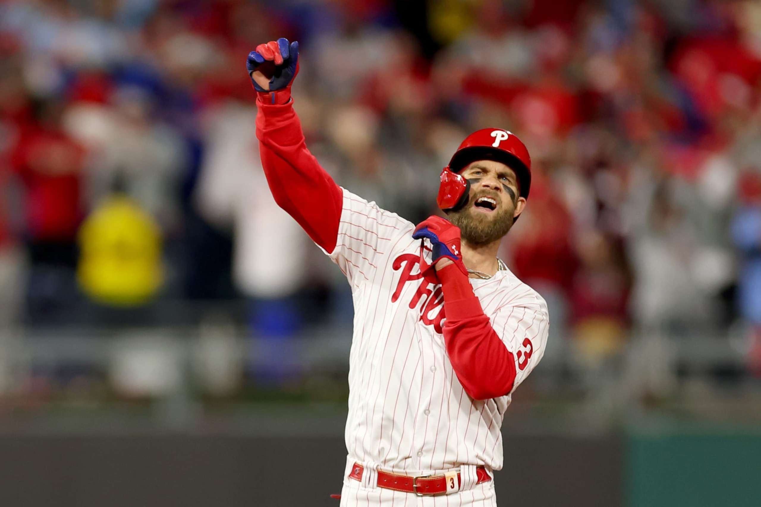 PHILADELPHIA, PENNSYLVANIA - OCTOBER 22: Bryce Harper #3 of the Philadelphia Phillies reacts after his RBI double during the fifth inning against the San Diego Padres in game four of the National League Championship Series at Citizens Bank Park on October 22, 2022 in Philadelphia, Pennsylvania. (Photo by Mike Ehrmann/Getty Images)