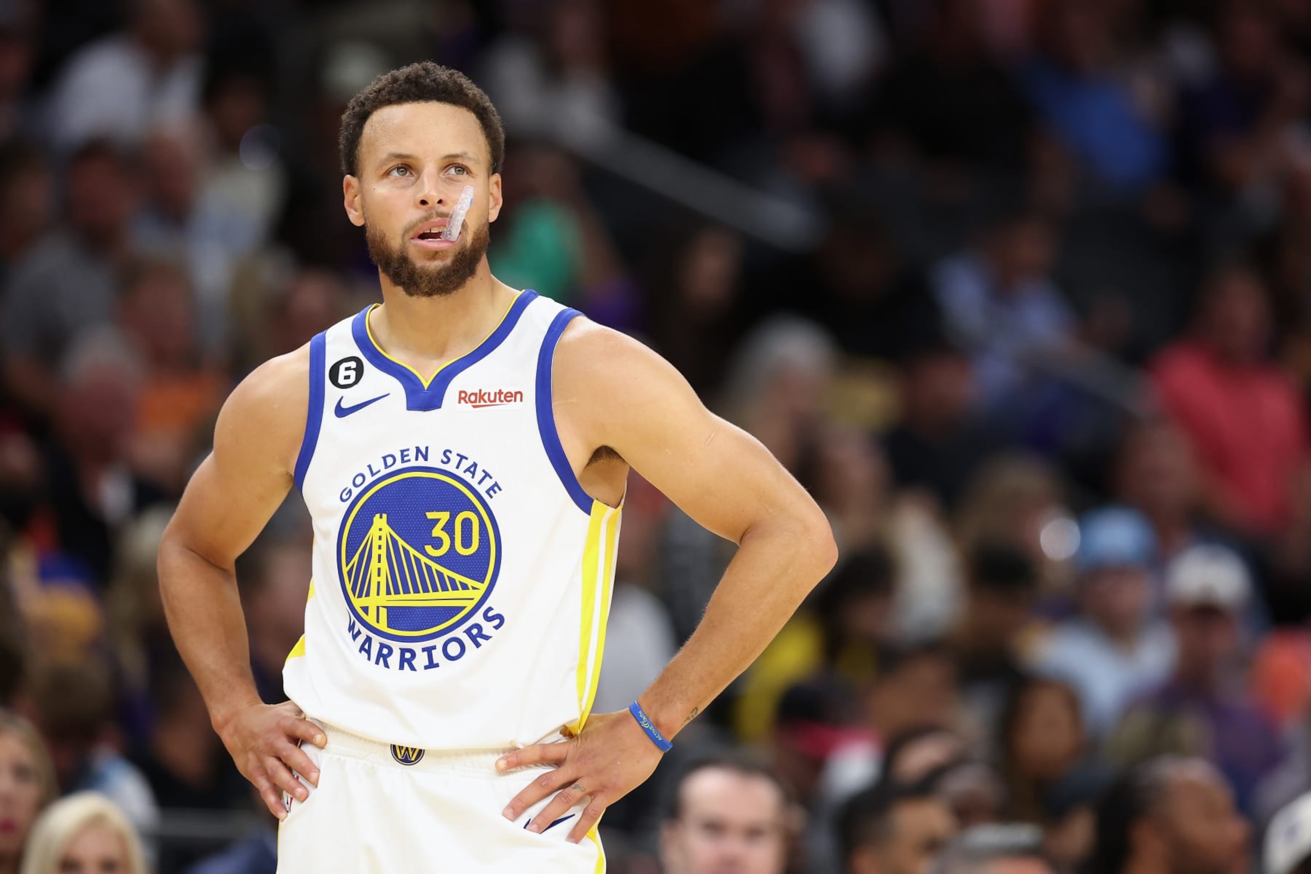 PHOENIX, ARIZONA - OCTOBER 25: Stephen Curry #30 of the Golden State Warriors reacts during the second half of the NBA game at Footprint Center on October 25, 2022 in Phoenix, Arizona. The Suns defeated the Warriors 134-105. NOTE TO USER: User expressly acknowledges and agrees that, by downloading and or using this photograph, User is consenting to the terms and conditions of the Getty Images License Agreement.  (Photo by Christian Petersen/Getty Images)