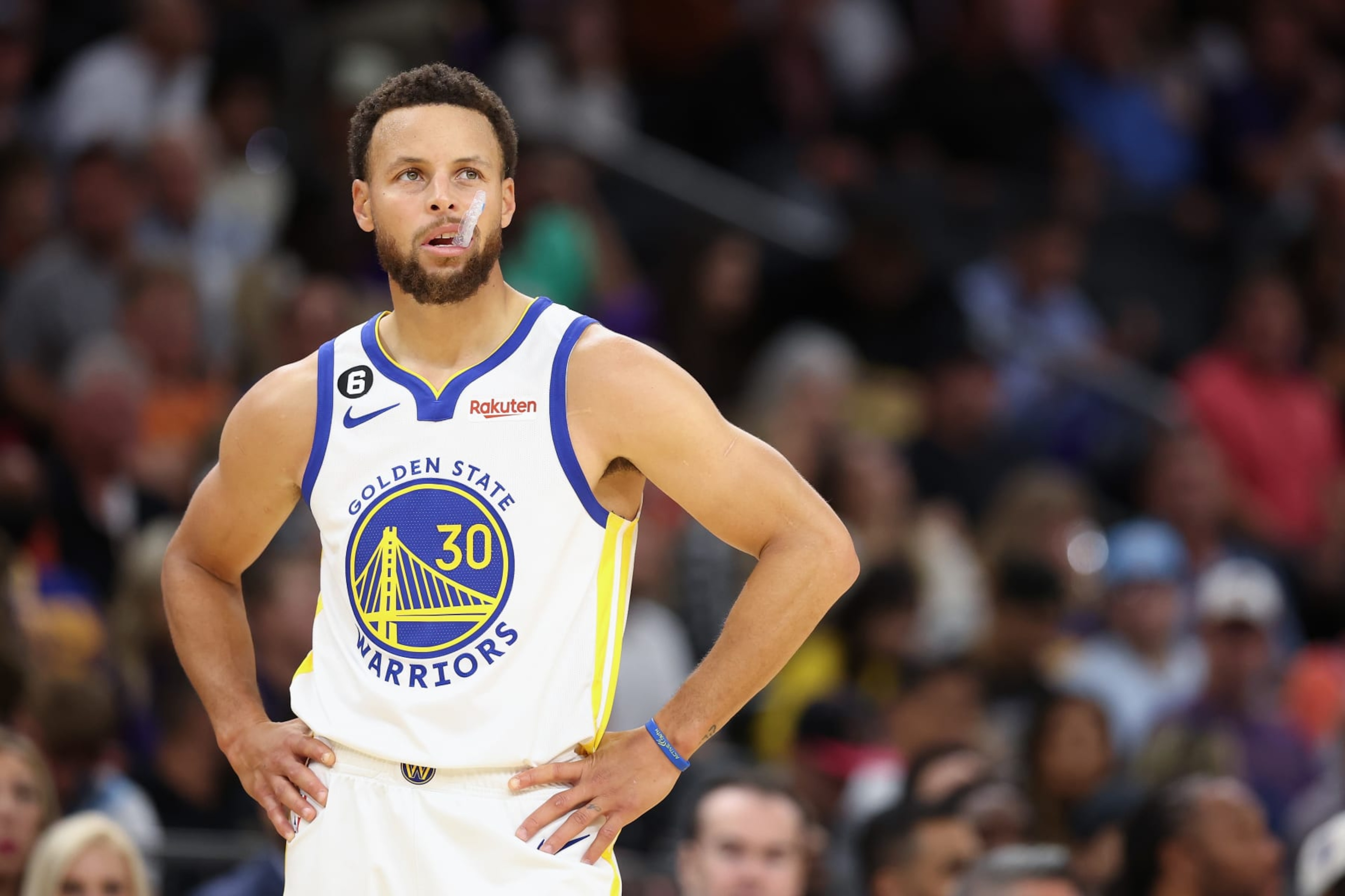 PHOENIX, ARIZONA - OCTOBER 25: Stephen Curry #30 of the Golden State Warriors reacts during the second half of the NBA game at Footprint Center on October 25, 2022 in Phoenix, Arizona. The Suns defeated the Warriors 134-105. NOTE TO USER: User expressly acknowledges and agrees that, by downloading and or using this photograph, User is consenting to the terms and conditions of the Getty Images License Agreement.  (Photo by Christian Petersen/Getty Images)