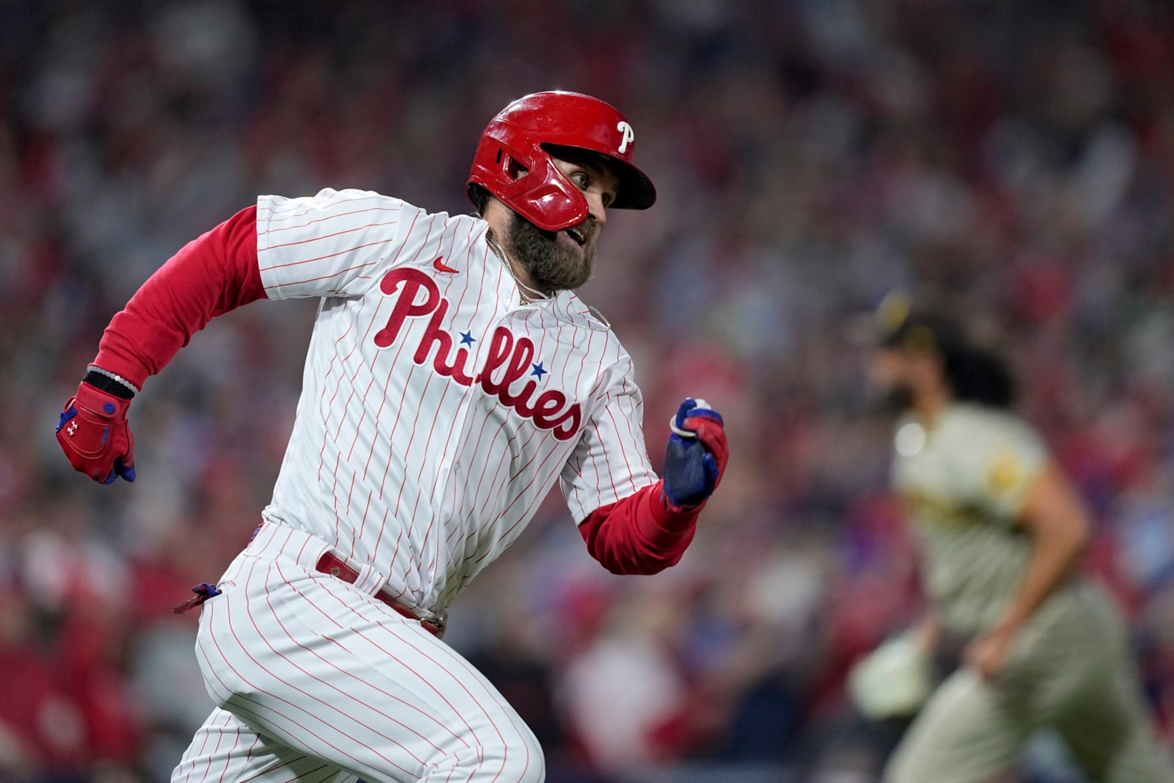 Philadelphia Phillies' Bryce Harper celebrates after his RBI double during the fifth inning in Game 4 of the baseball NL Championship Series between the San Diego Padres and the Phillies on Saturday, Oct. 22, 2022, in Philadelphia. (AP Photo/Matt Rourke) Philadelphia Phillies' Bryce Harper celebrates after his RBI double during the fifth inning in Game 4 of the baseball NL Championship Series between the San Diego Padres and the Phillies on Saturday, Oct. 22, 2022, in Philadelphia. (AP Photo/Matt Rourke)