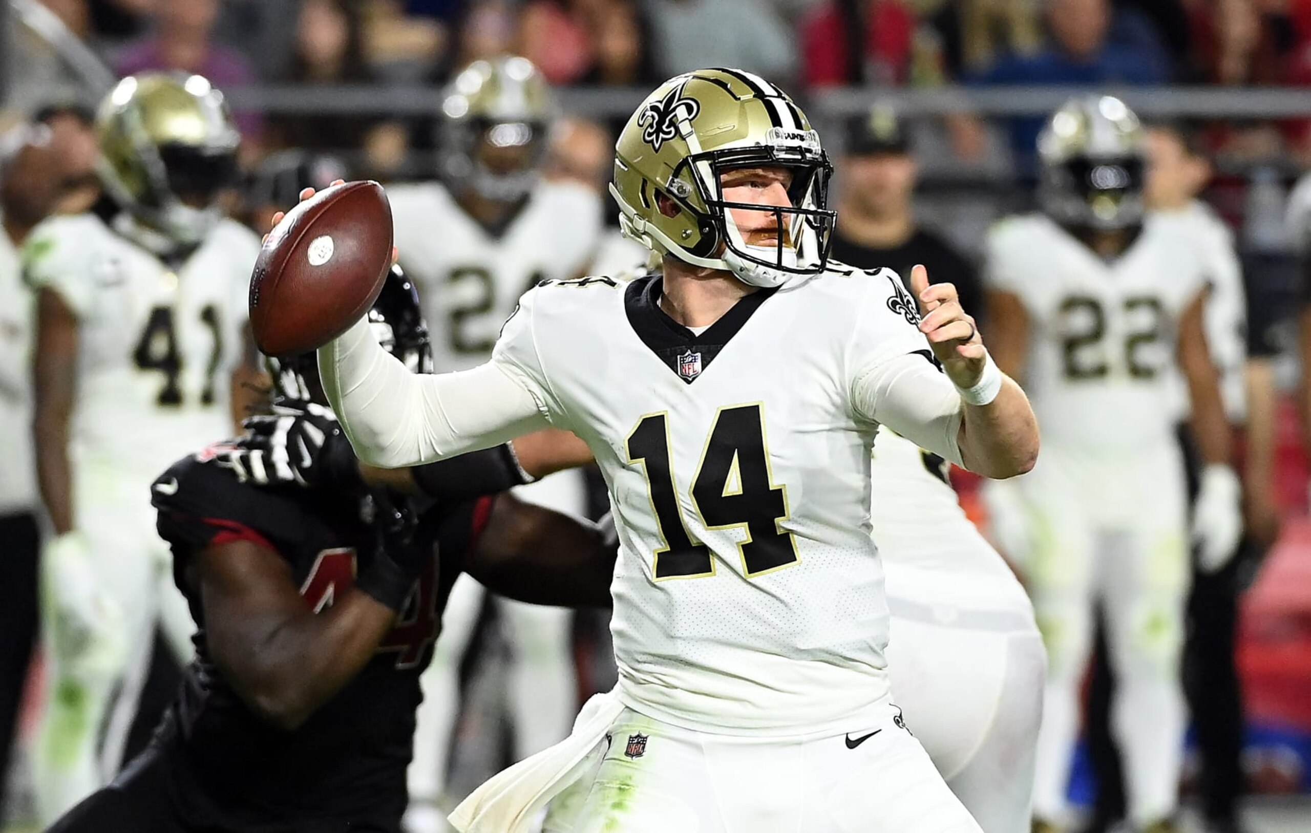 GLENDALE, ARIZONA - OCTOBER 20:  Quarterback Andy Dalton #14 of the New Orleans Saints passes during the 4th quarter of the game against the Arizona Cardinals at State Farm Stadium on October 20, 2022 in Glendale, Arizona. (Photo by Norm Hall/Getty Images)