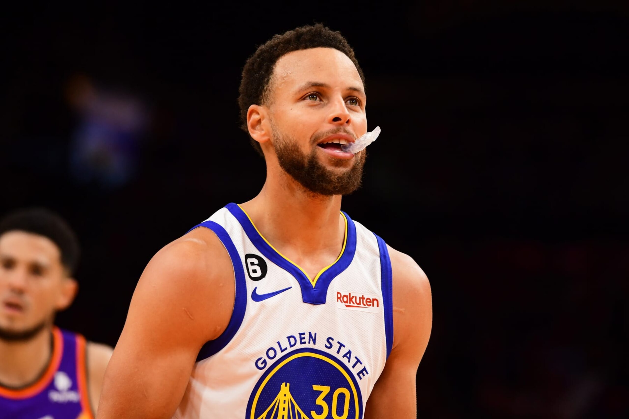PHOENIX, AZ - OCTOBER 25 Stephen Curry #30 of the Golden State Warriors looks on during the game against the Phoenix Suns on October 25 2022 at Footprint Center in Phoenix, Arizona. NOTE TO USER: User expressly acknowledges and agrees that, by downloading and or using this photograph, user is consenting to the terms and conditions of the Getty Images License Agreement. Mandatory Copyright Notice: Copyright 2022 NBAE (Photo by Kate Frese/NBAE via Getty Images)