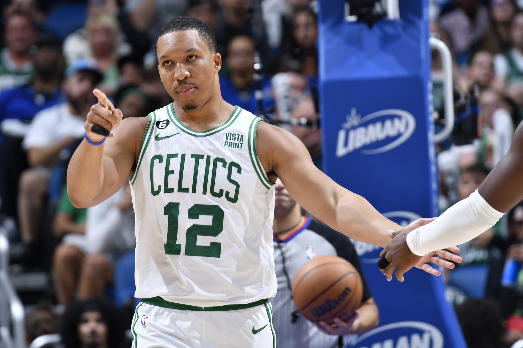 ORLANDO, FL - OCTOBER 22: Grant Williams #12 of the Boston Celtics celebrates during the game against the Orlando Magic on October 22, 2022 at Amway Center in Orlando, Florida. NOTE TO USER: User expressly acknowledges and agrees that, by downloading and or using this photograph, User is consenting to the terms and conditions of the Getty Images License Agreement. Mandatory Copyright Notice: Copyright 2022 NBAE (Photo by Fernando Medina/NBAE via Getty Images)