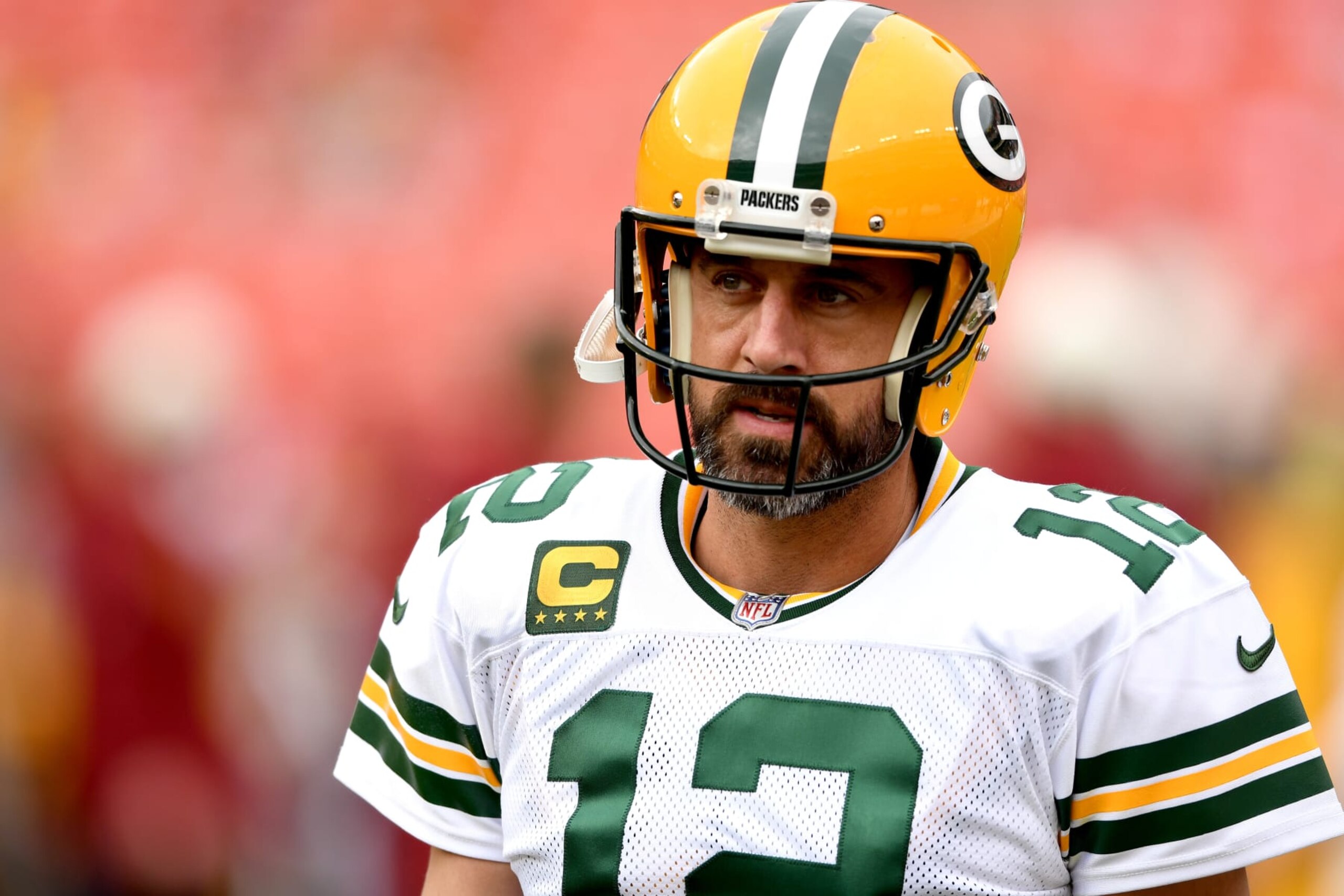 LANDOVER, MARYLAND - OCTOBER 23: Aaron Rodgers #12 of the Green Bay Packers looks on during warmups before the game against the Washington Commanders at FedExField on October 23, 2022 in Landover, Maryland. (Photo by Mitchell Layton/Getty Images)