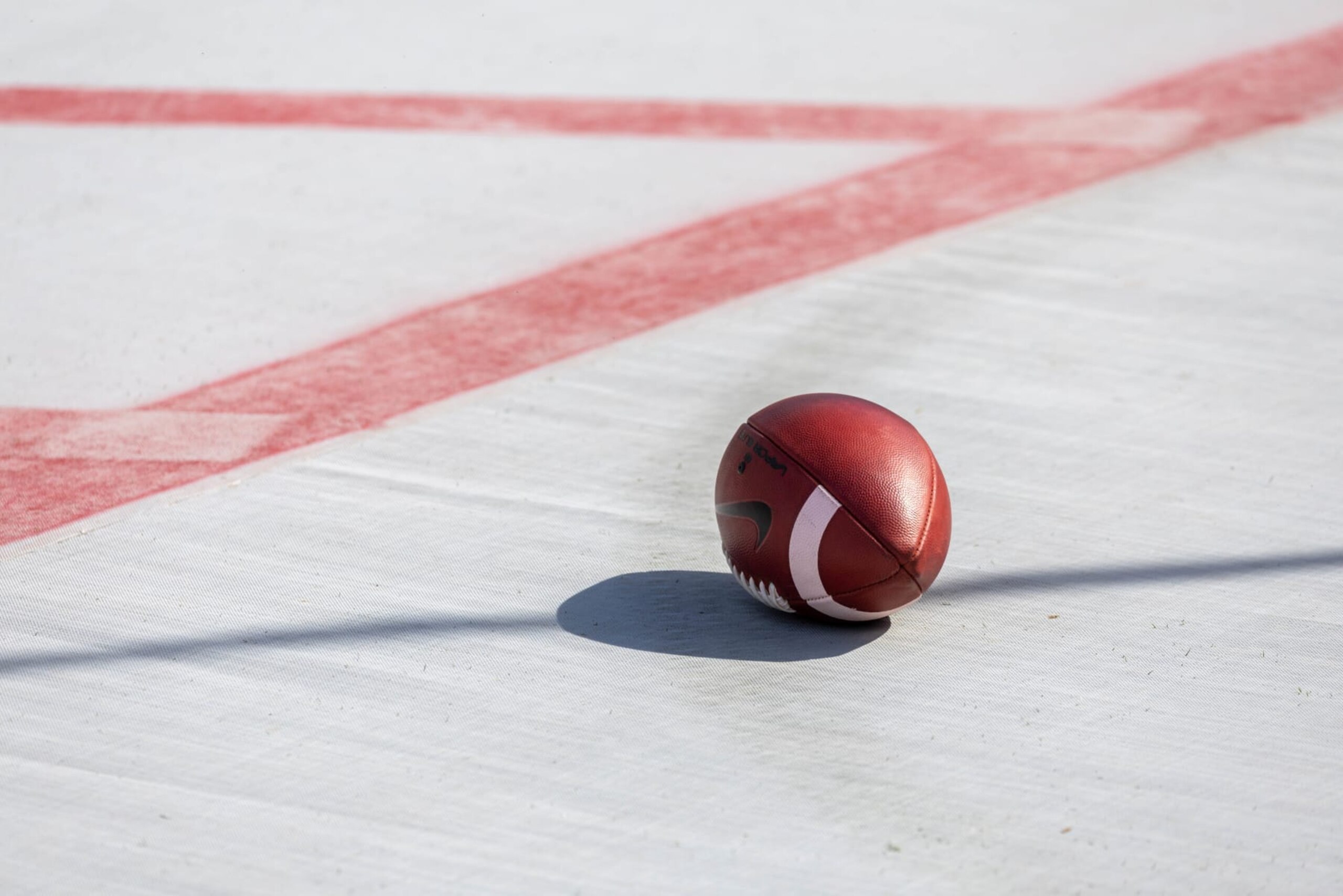 PALO ALTO, CA - OCTOBER 22:  A football sits on the sidelines before an NCAA Pac-12 college football game between the Arizona State Sun Devils and the Stanford Cardinal on October 22, 2022 at Stanford Stadium in Palo Alto, California.  (Photo by David Madison/Getty Images)