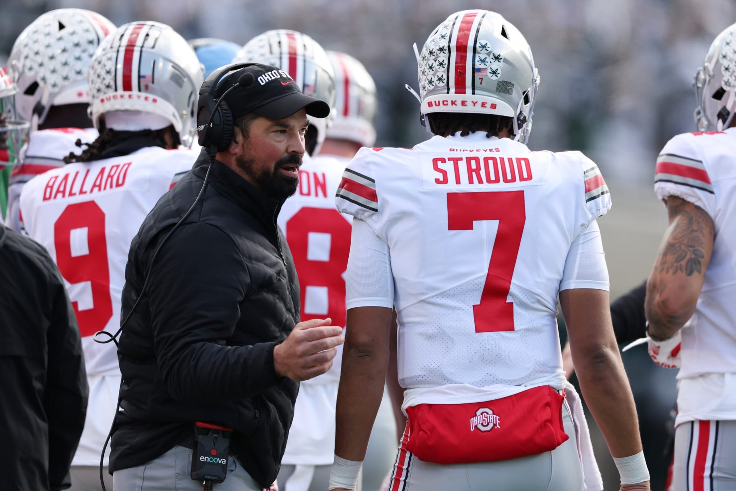 EAST LANSING, MICHIGAN - OCTOBER 08: Head coach Ryan Day of the Ohio State Buckeyes talks with C.J. Stroud #7 during the first half while playing the Michigan State Spartans at Spartan Stadium on October 08, 2022 in East Lansing, Michigan. (Photo by Gregory Shamus/Getty Images)