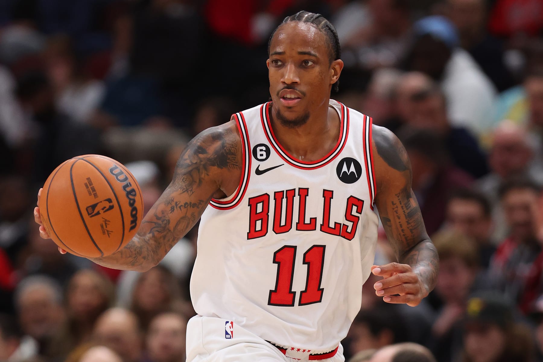 CHICAGO, ILLINOIS - OCTOBER 26: DeMar DeRozan #11 of the Chicago Bulls dribbles up the court against the Indiana Pacers during the second half at United Center on October 26, 2022 in Chicago, Illinois. NOTE TO USER: User expressly acknowledges and agrees that, by downloading and or using this photograph, User is consenting to the terms and conditions of the Getty Images License Agreement. (Photo by Michael Reaves/Getty Images)