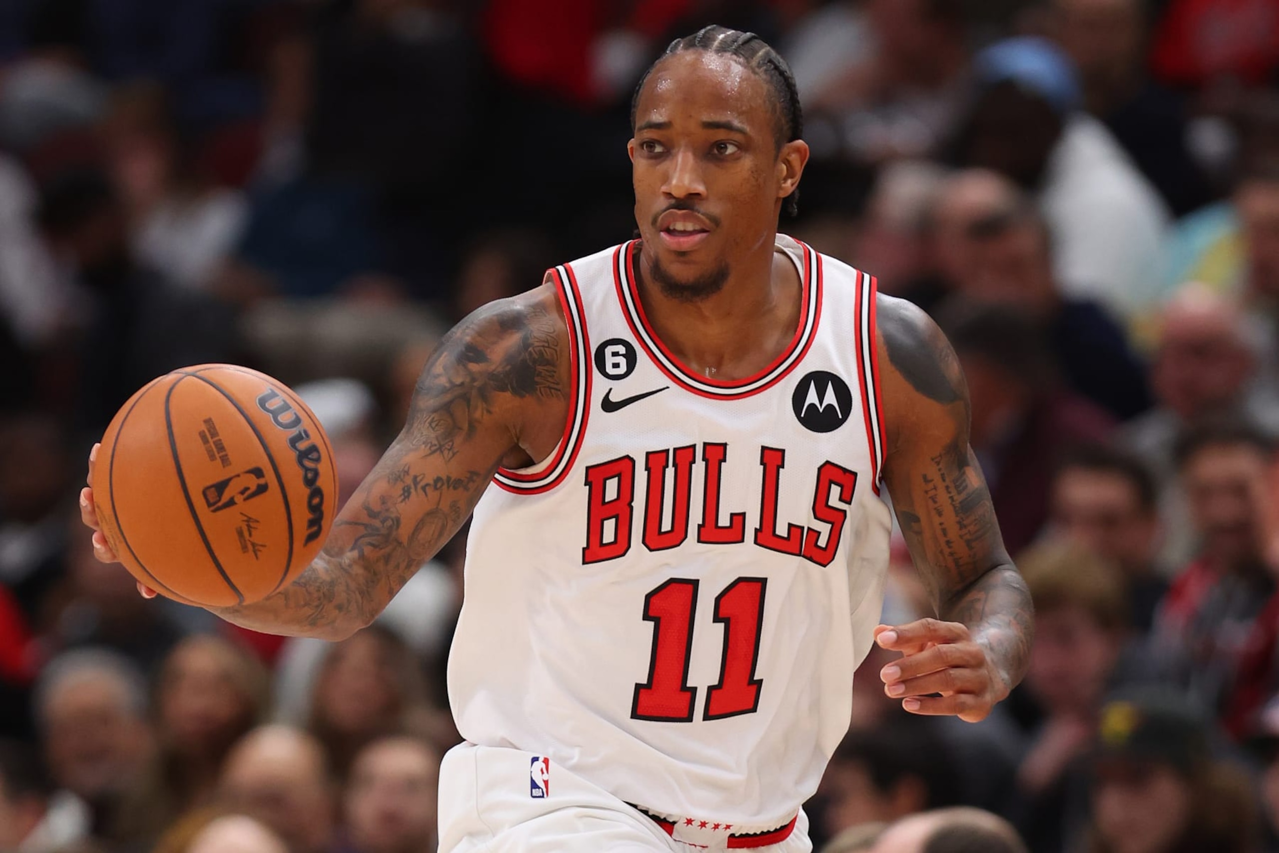 CHICAGO, ILLINOIS - OCTOBER 26: DeMar DeRozan #11 of the Chicago Bulls dribbles up the court against the Indiana Pacers during the second half at United Center on October 26, 2022 in Chicago, Illinois. NOTE TO USER: User expressly acknowledges and agrees that, by downloading and or using this photograph, User is consenting to the terms and conditions of the Getty Images License Agreement. (Photo by Michael Reaves/Getty Images)