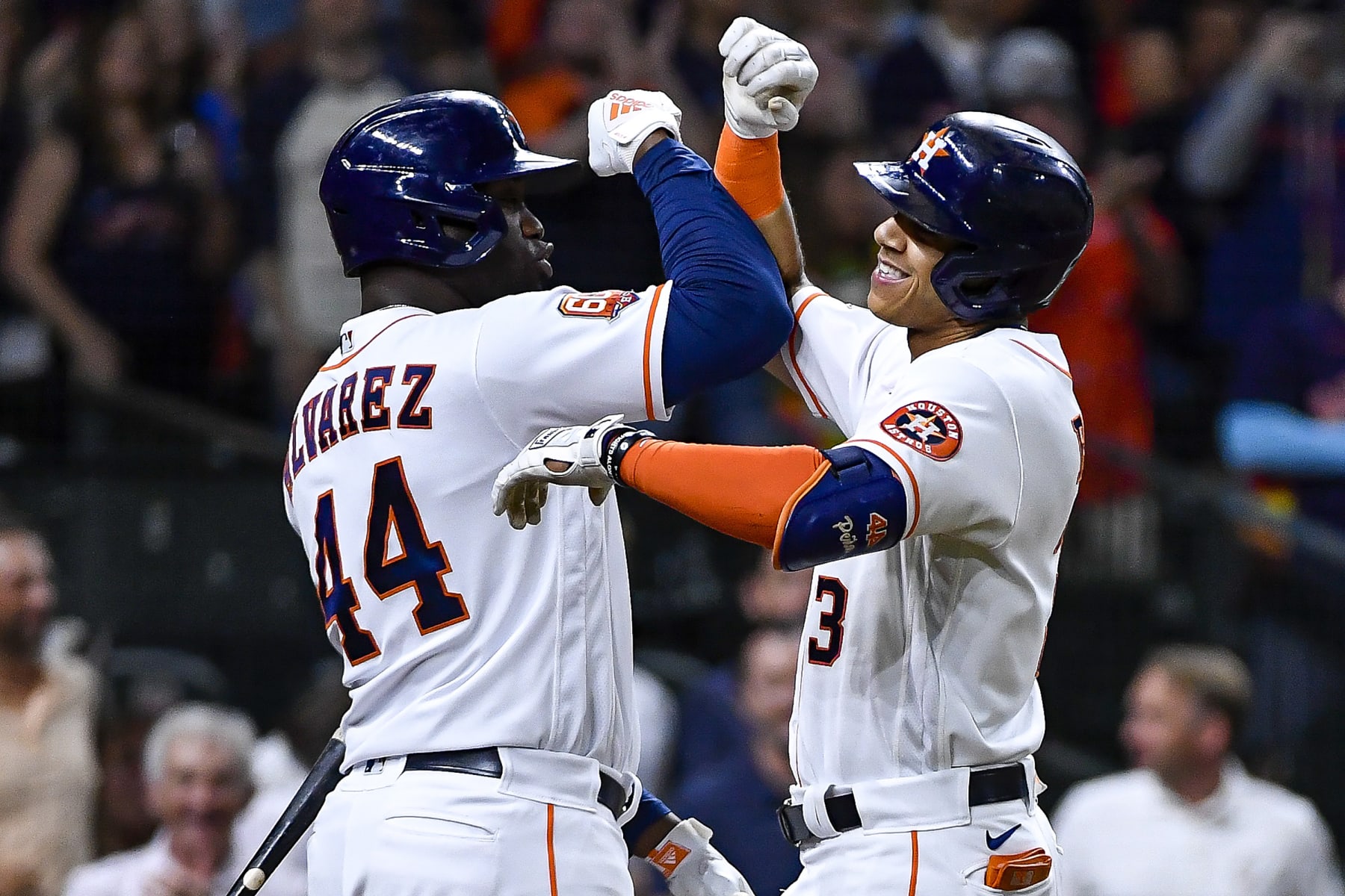 HOUSTON, TEXAS - OCTOBER 04: Jeremy Pena #3 celebrates with Yordan Alvarez #44 of the Houston Astros after hitting a home run against the Philadelphia Phillies at Minute Maid Park on October 04, 2022 in Houston, Texas. (Photo by Logan Riely/Getty Images)