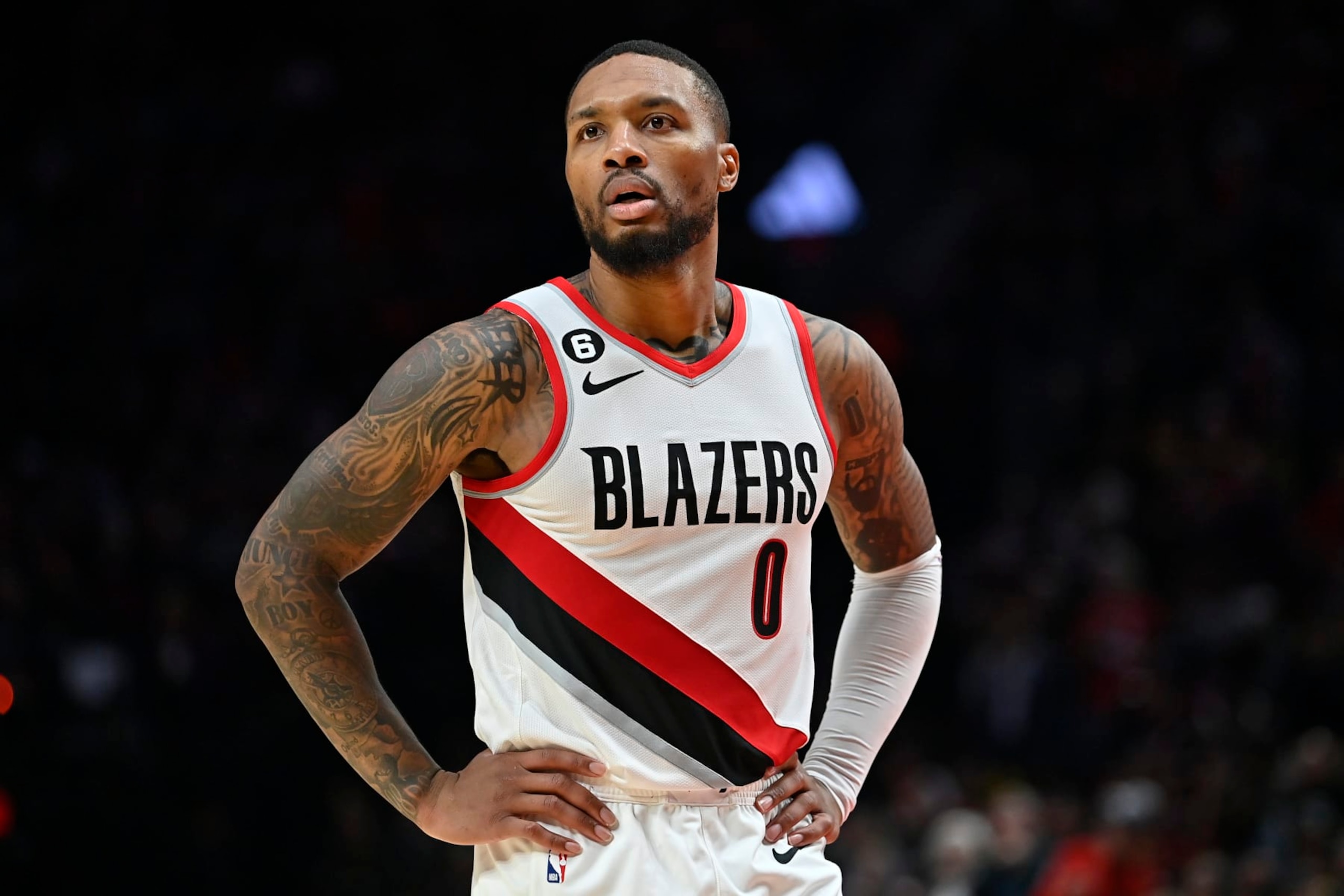 PORTLAND, OREGON - OCTOBER 24: Damian Lillard #0 of the Portland Trail Blazers looks on during the third quarter against the Denver Nuggets at Moda Center on October 24, 2022 in Portland, Oregon. The Portland Trail Blazers won 135-110. NOTE TO USER: User expressly acknowledges and agrees that, by downloading and or using this photograph, User is consenting to the terms and conditions of the Getty Images License Agreement. (Photo by Alika Jenner/Getty Images)