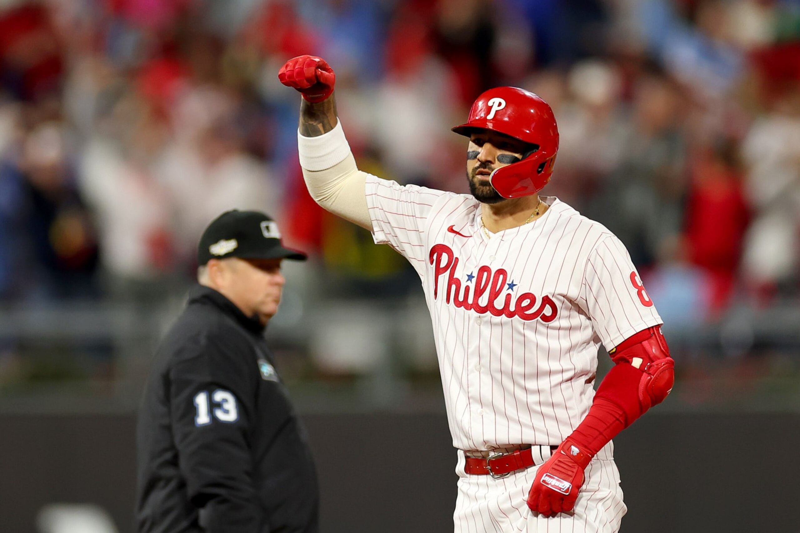 PHILADELPHIA, PENNSYLVANIA - OCTOBER 22: Nick Castellanos #8 of the Philadelphia Phillies reacts after his double during the fourth inning against the San Diego Padres in game four of the National League Championship Series at Citizens Bank Park on October 22, 2022 in Philadelphia, Pennsylvania. (Photo by Mike Ehrmann/Getty Images)