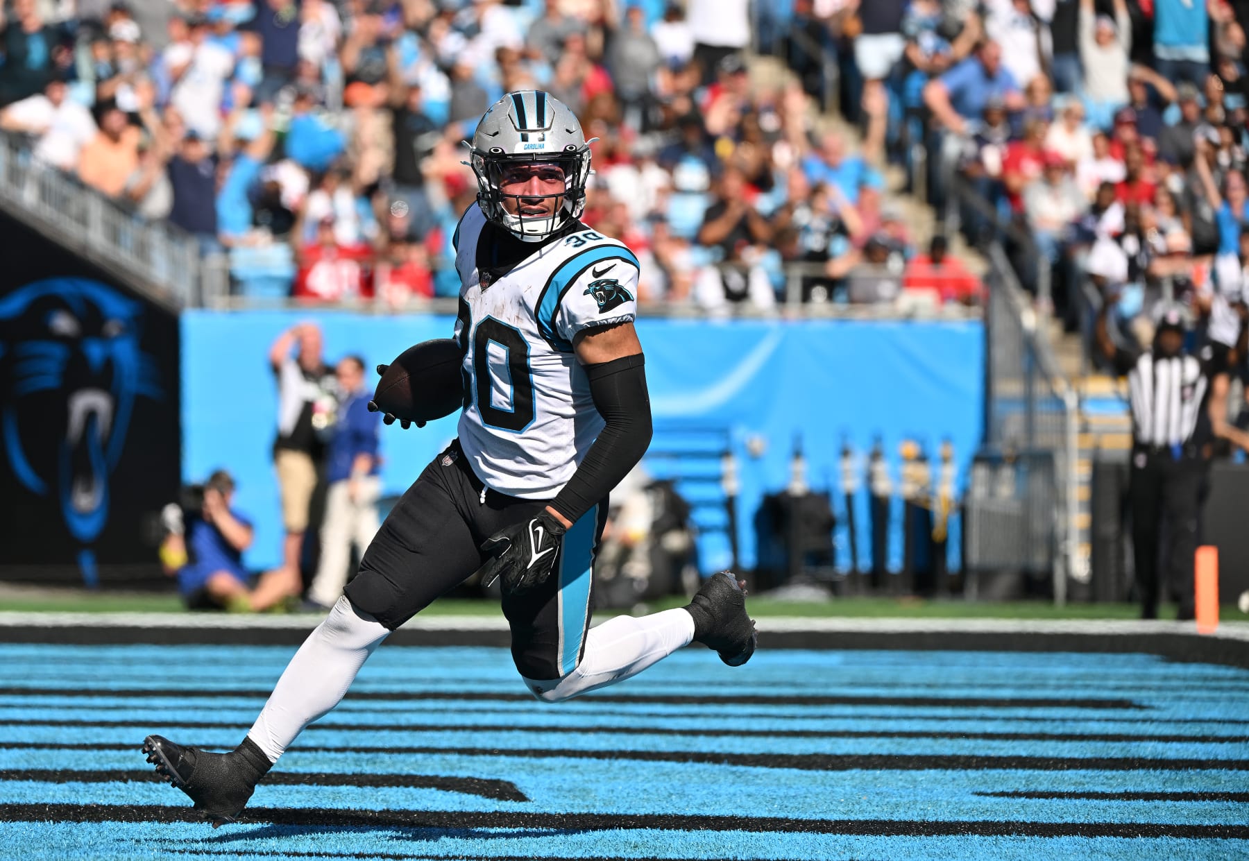 CHARLOTTE, NORTH CAROLINA - OCTOBER 23: Chuba Hubbard #30 of the Carolina Panthers reacts after scoring a touchdown against the Tampa Bay Buccaneers during their game at Bank of America Stadium on October 23, 2022 in Charlotte, North Carolina. (Photo by Grant Halverson/Getty Images)