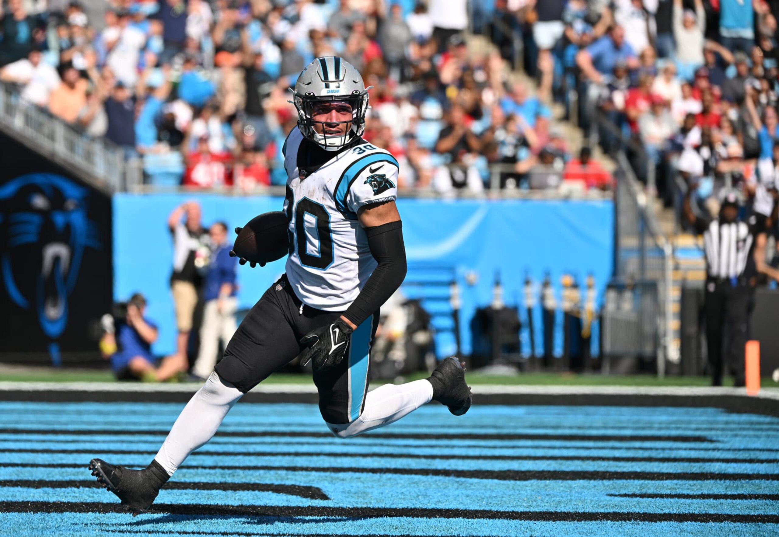 CHARLOTTE, NORTH CAROLINA - OCTOBER 23: Chuba Hubbard #30 of the Carolina Panthers reacts after scoring a touchdown against the Tampa Bay Buccaneers during their game at Bank of America Stadium on October 23, 2022 in Charlotte, North Carolina. (Photo by Grant Halverson/Getty Images)