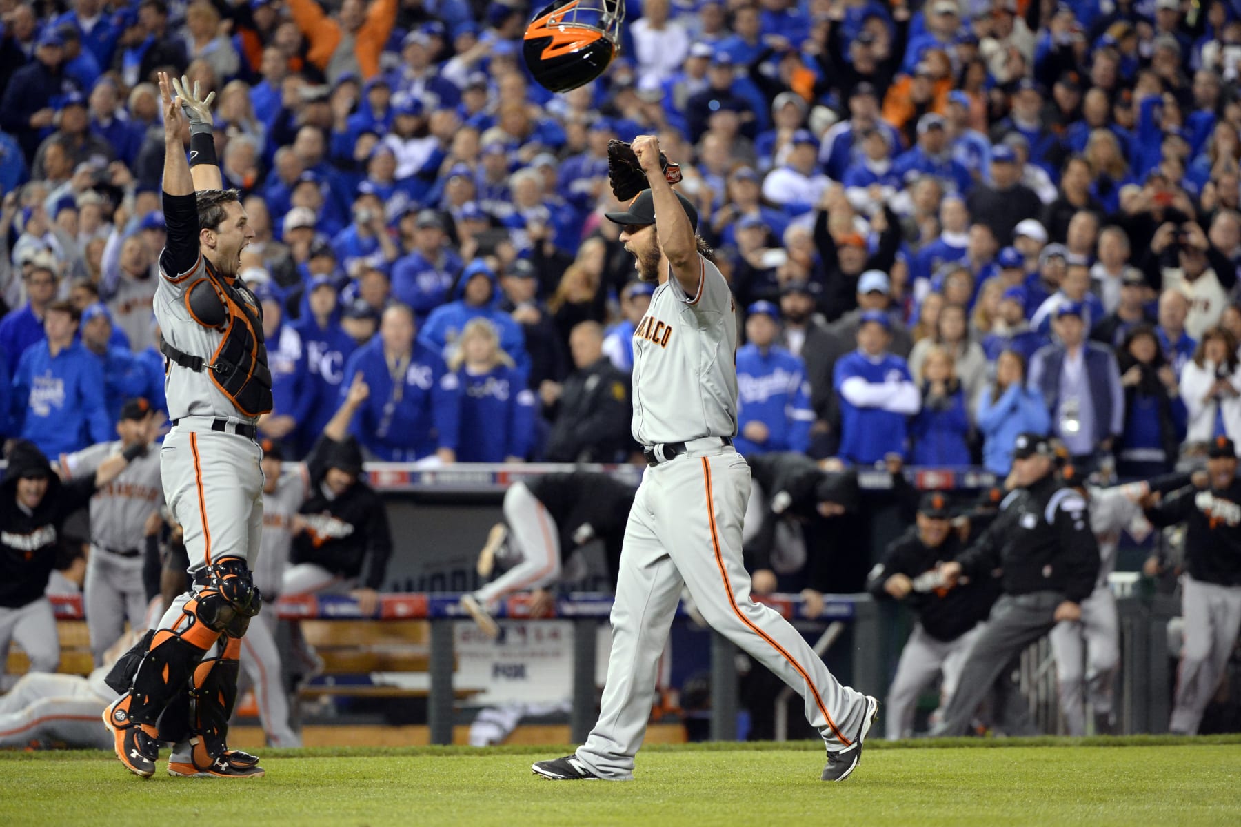 KANSAS CITY, MO - OCTOBER 29:  Buster Posey #28 and Madison Bumgarner #40 of the San Francisco Giants celebrate after defeating the Kansas City Royals in Game 7 of the 2014 World Series on Wednesday, October 29, 2014 at Kauffman Stadium in Kansas City, Missouri. (Photo by Ron Vesely/MLB Photos via Getty Images)