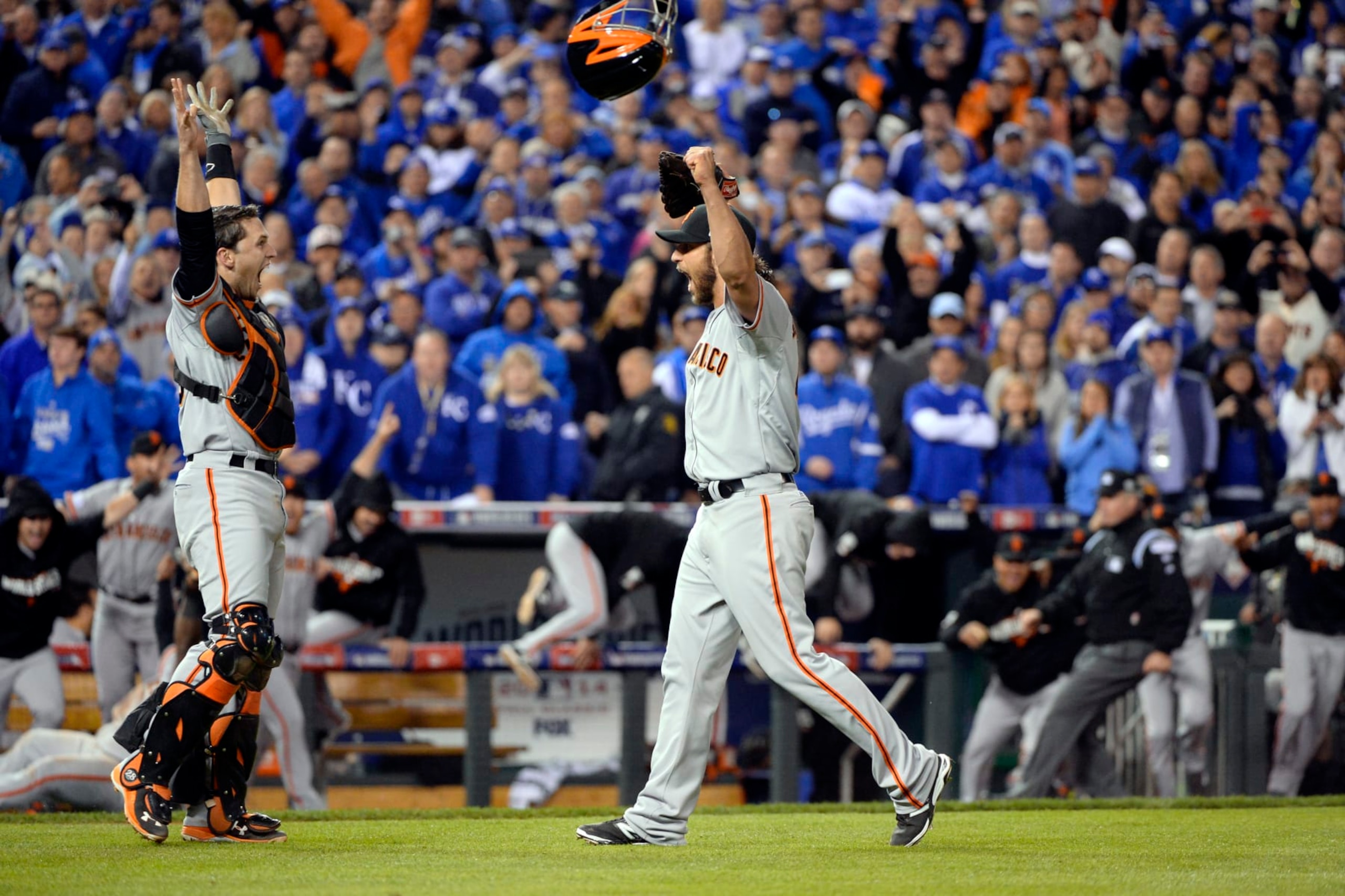 KANSAS CITY, MO - OCTOBER 29:  Buster Posey #28 and Madison Bumgarner #40 of the San Francisco Giants celebrate after defeating the Kansas City Royals in Game 7 of the 2014 World Series on Wednesday, October 29, 2014 at Kauffman Stadium in Kansas City, Missouri. (Photo by Ron Vesely/MLB Photos via Getty Images)