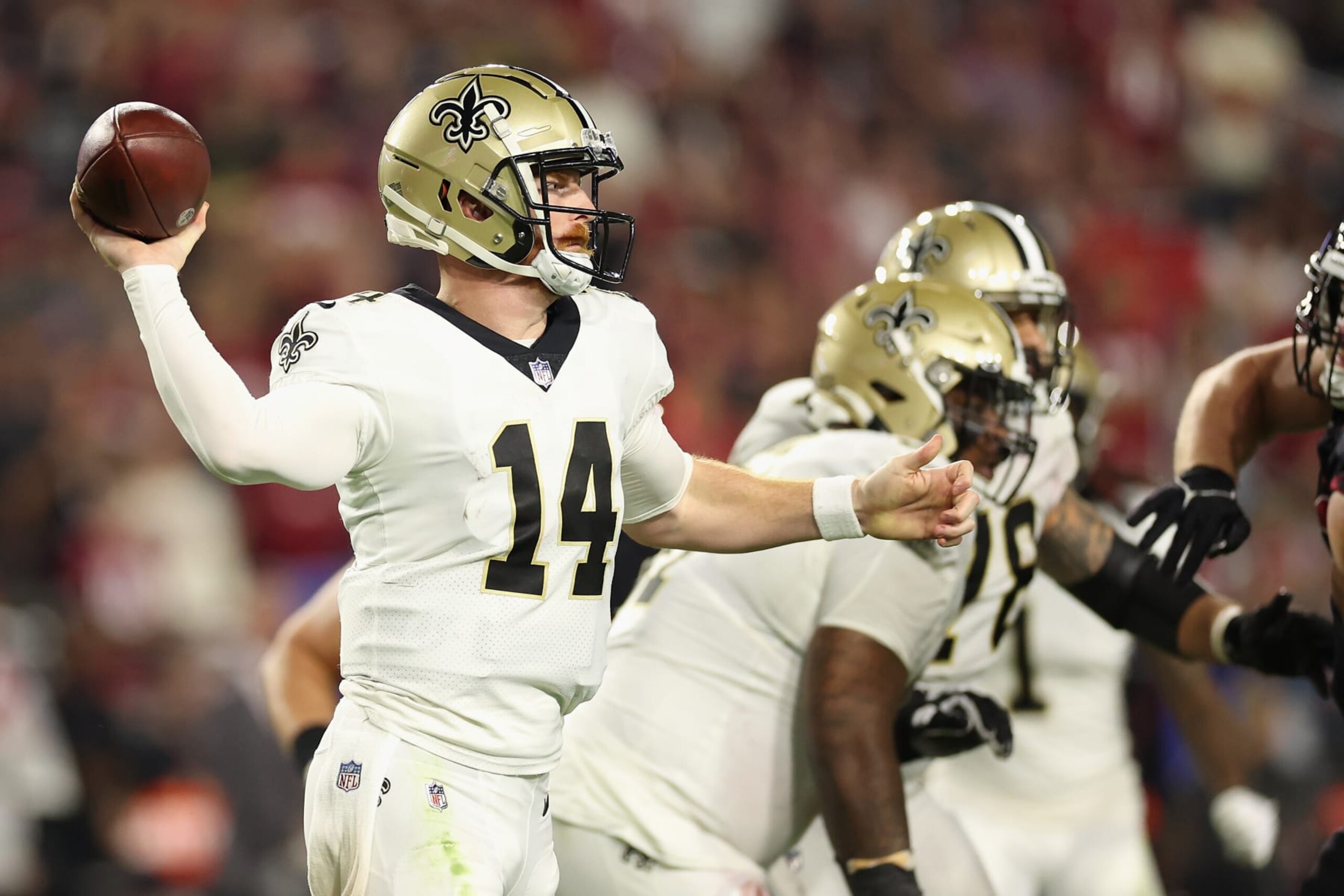 GLENDALE, ARIZONA - OCTOBER 20: Quarterback Andy Dalton #14 of the New Orleans Saints throws a pass during the NFL game against the Arizona Cardinals at State Farm Stadium on October 20, 2022 in Glendale, Arizona. The Cardinals defeated the Saints 42-34.  (Photo by Christian Petersen/Getty Images)