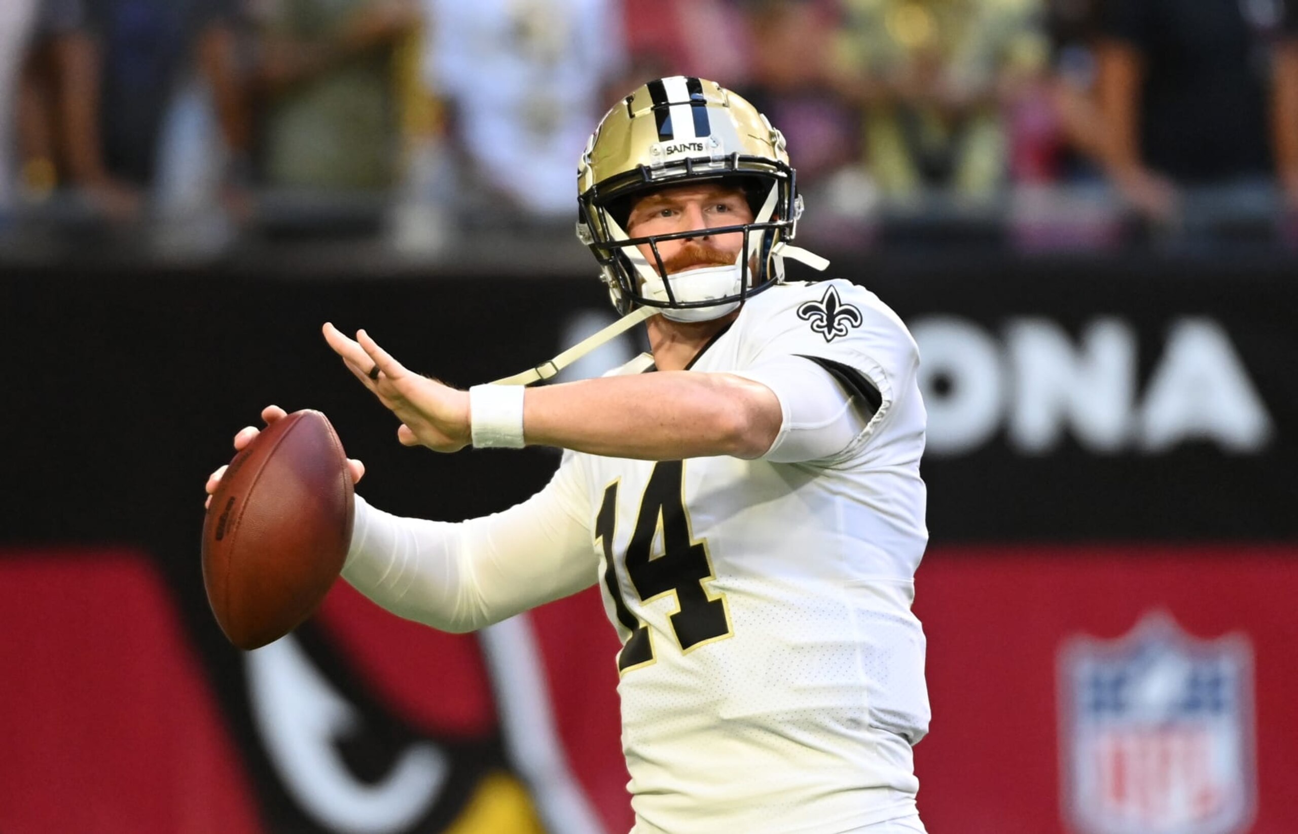 GLENDALE, ARIZONA - OCTOBER 20: Andy Dalton #14 of the New Orleans Saints prepares for a game against the Arizona Cardinals at State Farm Stadium on October 20, 2022 in Glendale, Arizona. (Photo by Norm Hall/Getty Images)