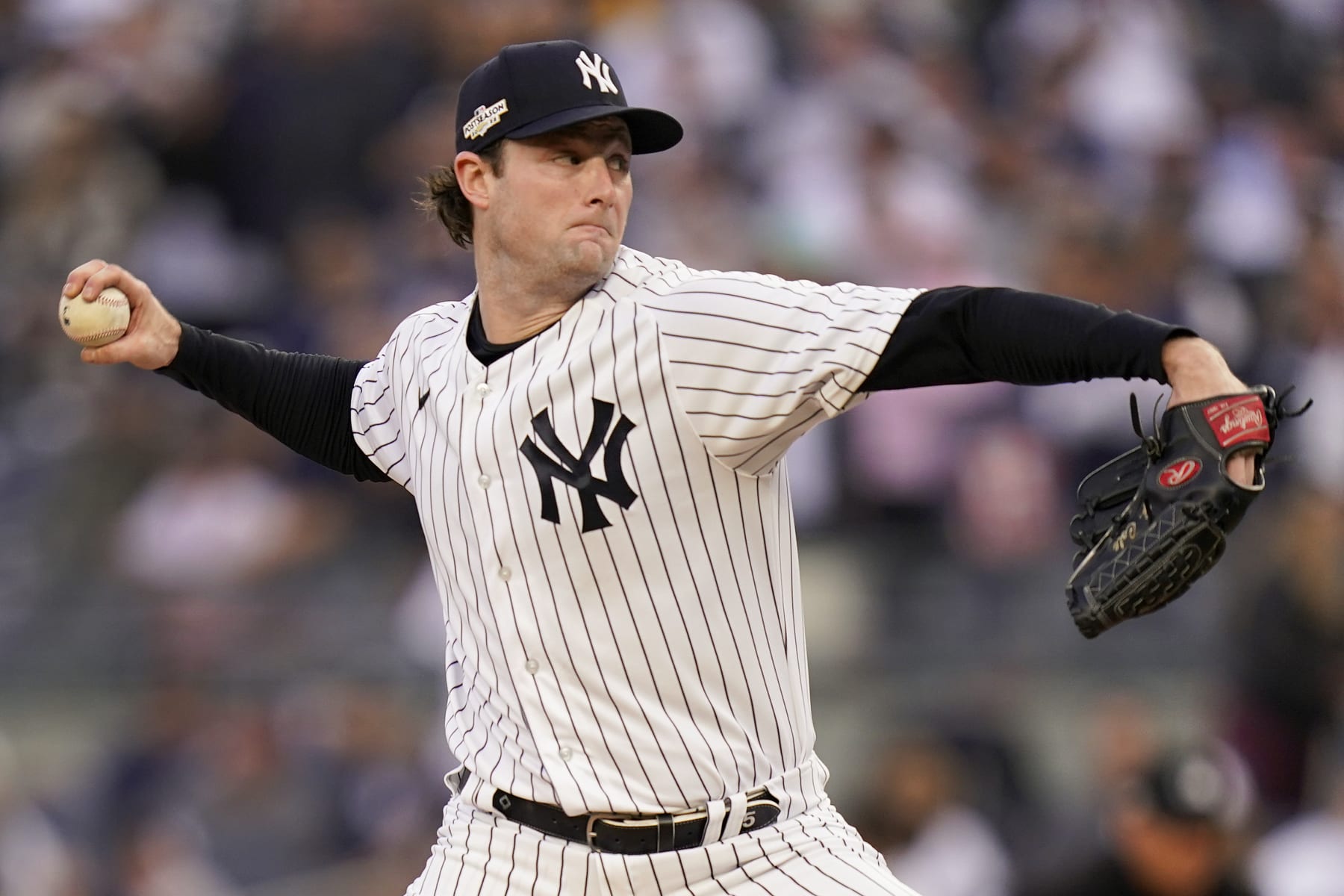 New York Yankees starting pitcher Gerrit Cole delivers against the Houston Astros during the first inning of Game 3 of an American League Championship baseball series, Saturday, Oct. 22, 2022, in New York. (AP Photo/Seth Wenig)