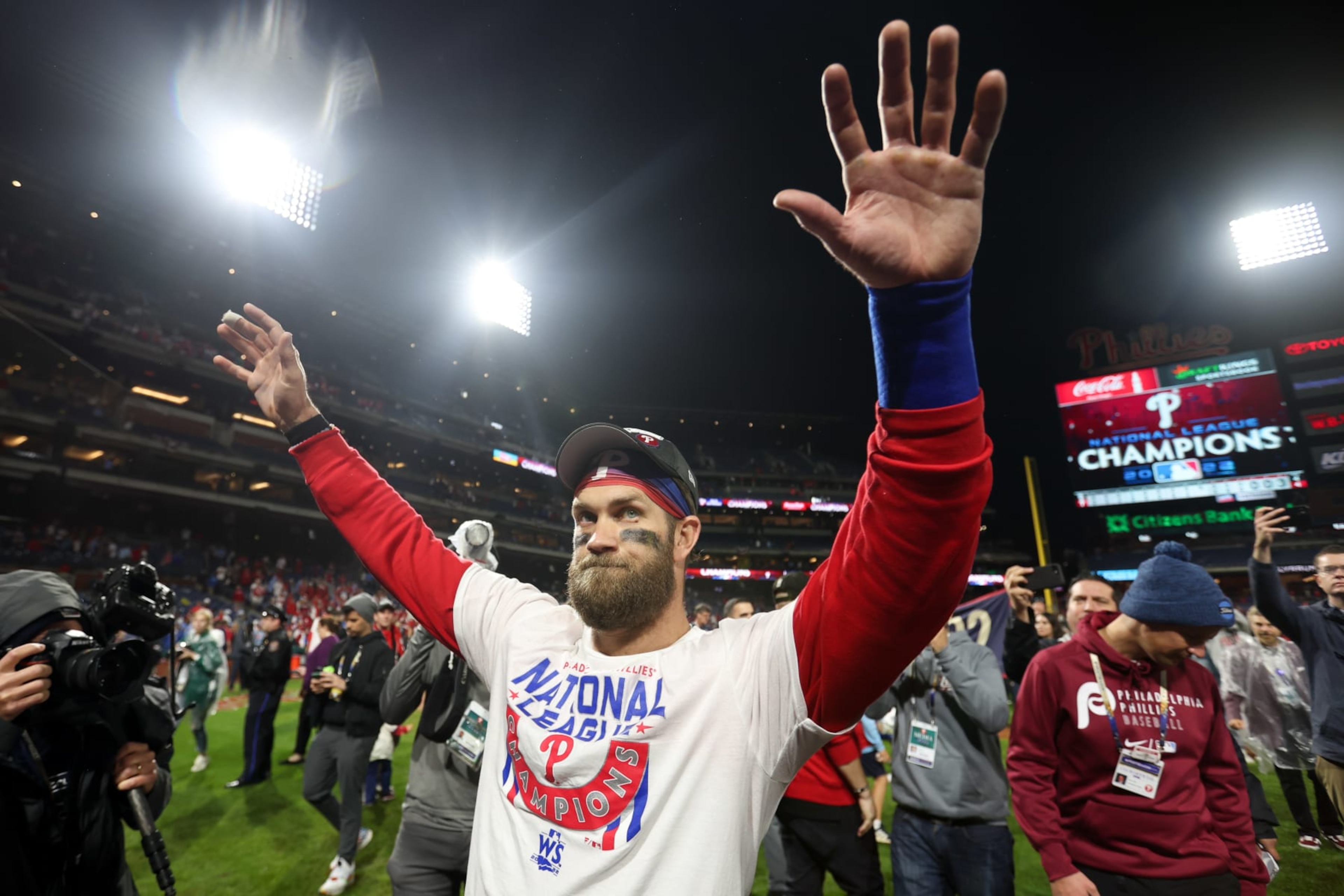 PHILADELPHIA, PA - OCTOBER 23:   Bryce Harper #3 of the Philadelphia Phillies celebrates after the Phillies took Game 5 and won the NLCS against the San Diego Padres at Citizens Bank Park on Sunday, October 23, 2022 in Philadelphia, Pennsylvania. (Photo by Rob Tringali/MLB Photos via Getty Images)