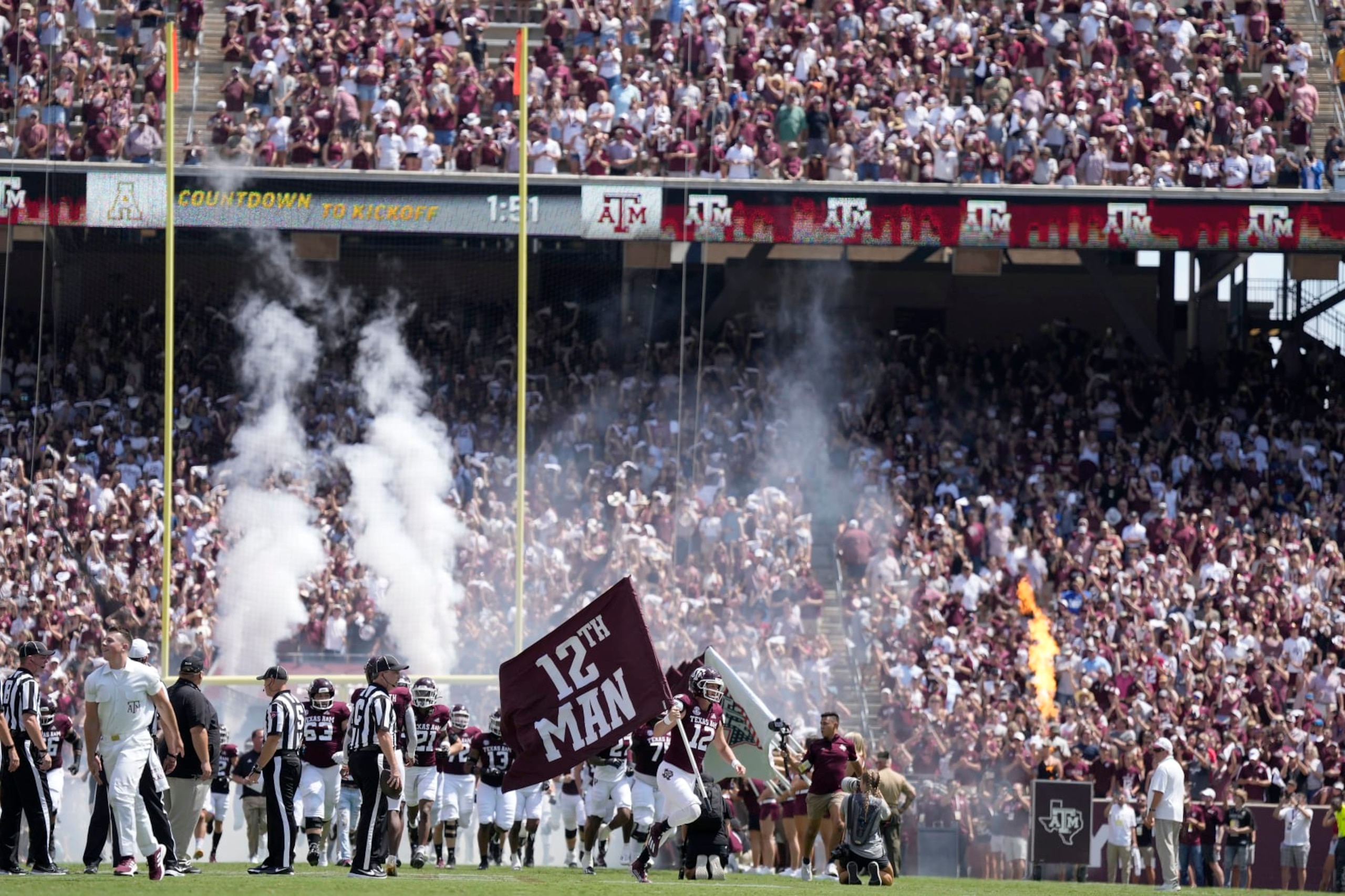 Texas A&M safety Connor Choate (12) leads the Aggies on to Kyle Field before the stat of an NCAA college football game against Appalachian State on Saturday, Sept. 10, 2022, in College Station, Texas. (AP Photo/Sam Craft)