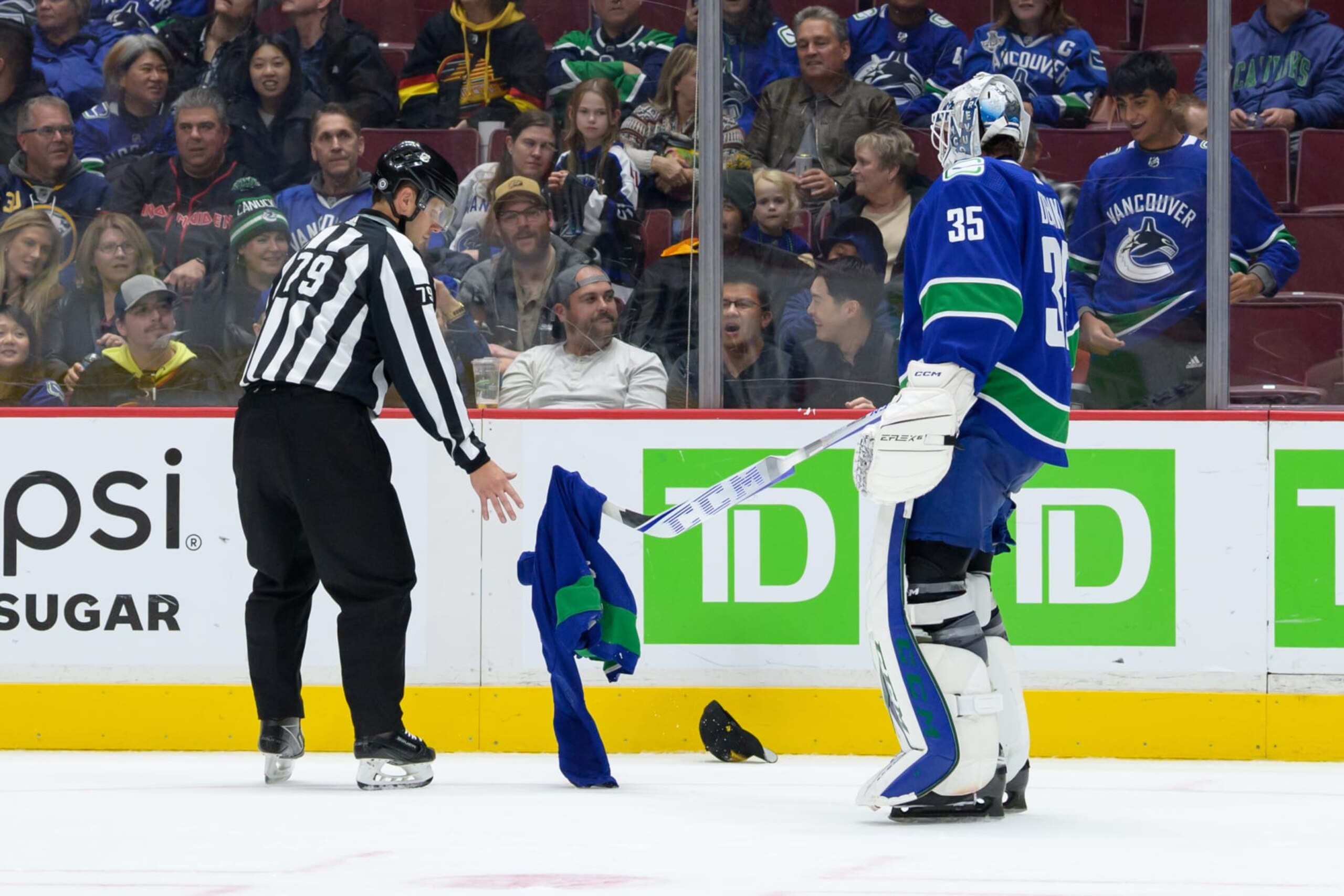 Canucks fans are so upset they're throwing their jerseys away on the ice Canucks fans are so upset they're throwing their jerseys away on the ice