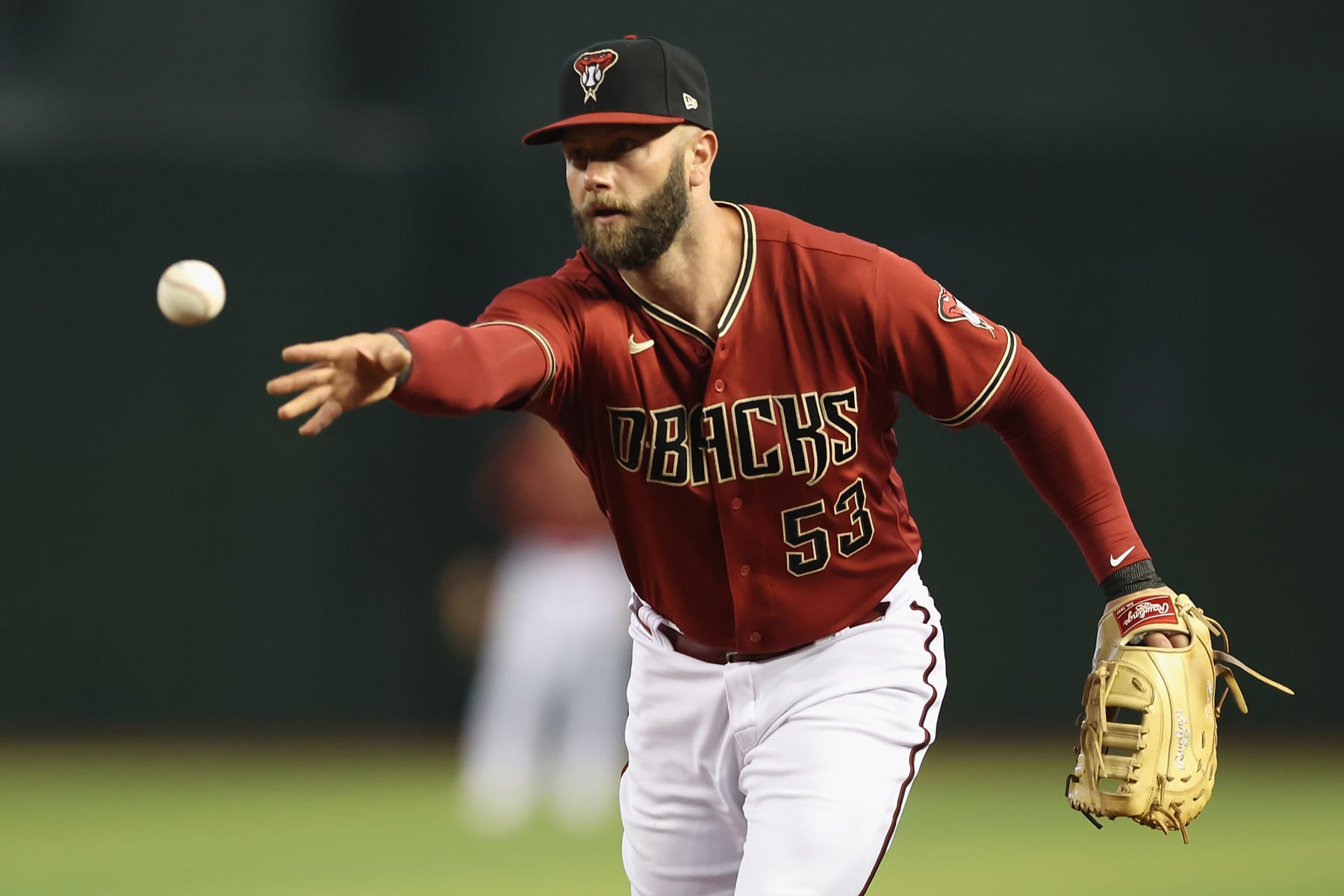 PHOENIX, ARIZONA - MAY 29: Infielder Christian Walker #53 of the Arizona Diamondbacks fields a ground ball out during the first inning of the MLB game against the Los Angeles Dodgers at Chase Field on May 29, 2022 in Phoenix, Arizona. (Photo by Christian Petersen/Getty Images)