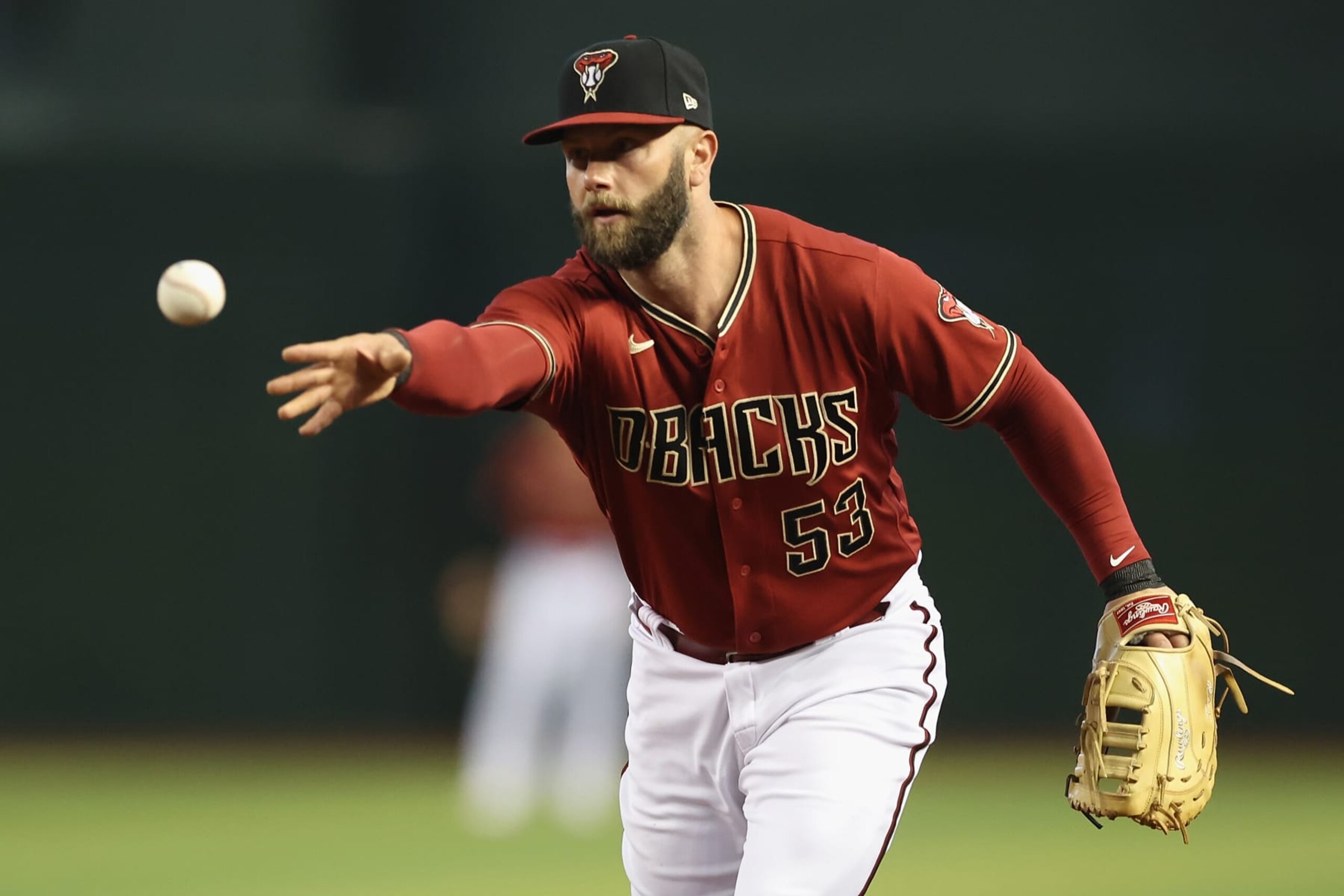 PHOENIX, ARIZONA - MAY 29: Infielder Christian Walker #53 of the Arizona Diamondbacks fields a ground ball out during the first inning of the MLB game against the Los Angeles Dodgers at Chase Field on May 29, 2022 in Phoenix, Arizona. (Photo by Christian Petersen/Getty Images)