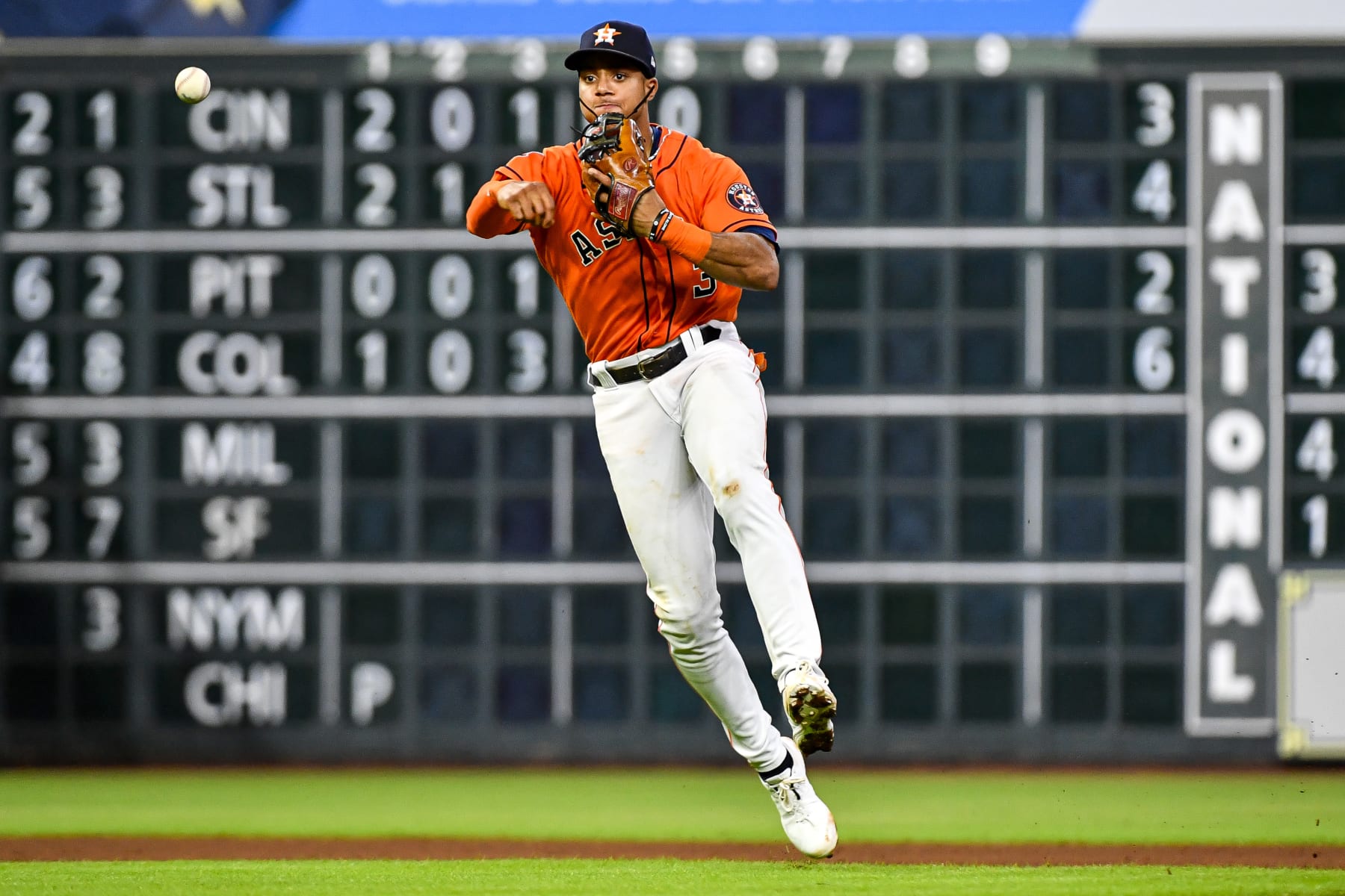 HOUSTON, TEXAS - JULY 15: Jeremy Pena #3 of the Houston Astros fields a ball in the ninth inning against the Oakland Athletics at Minute Maid Park on July 15, 2022 in Houston, Texas. (Photo by Logan Riely/Getty Images)