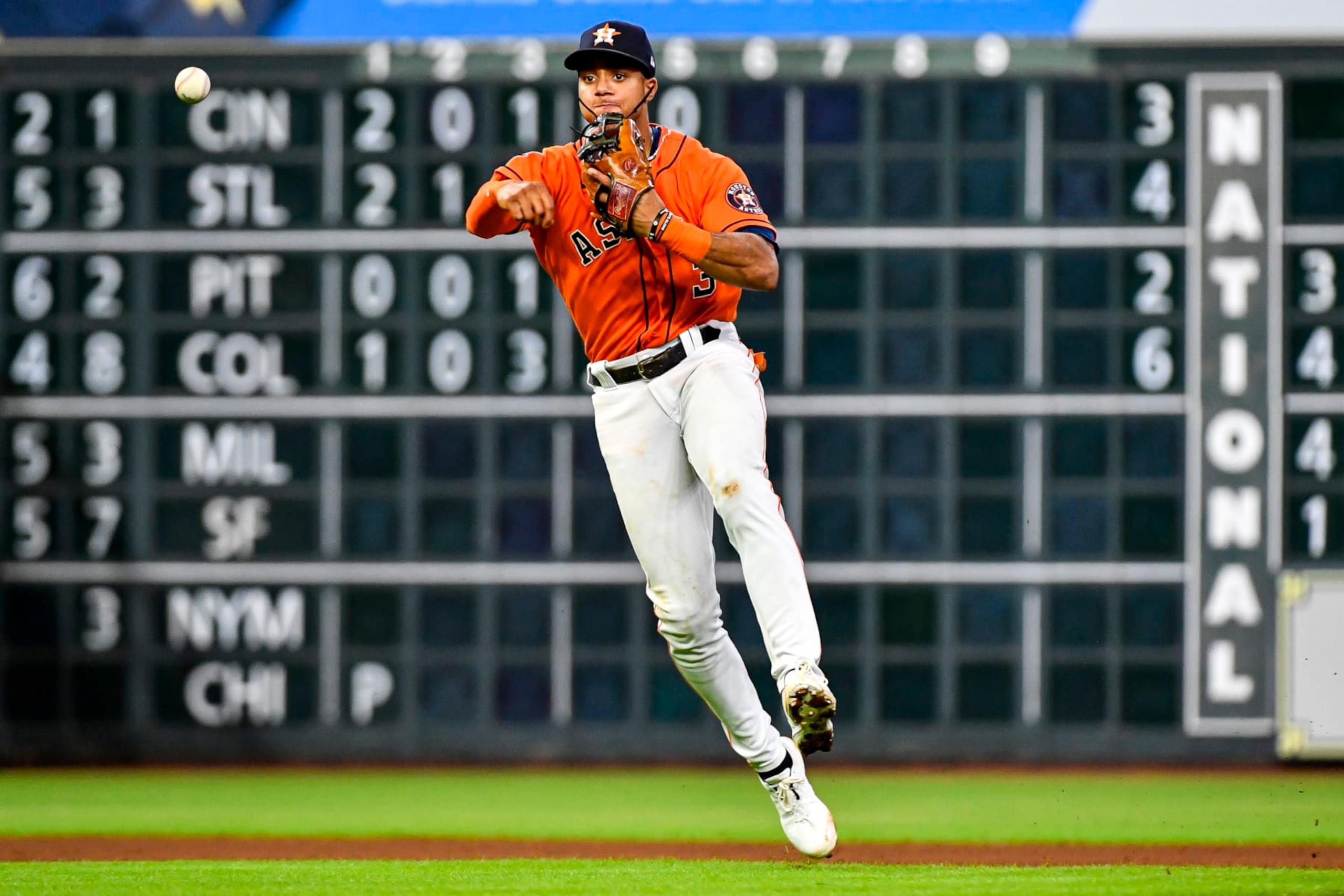 HOUSTON, TEXAS - JULY 15: Jeremy Pena #3 of the Houston Astros fields a ball in the ninth inning against the Oakland Athletics at Minute Maid Park on July 15, 2022 in Houston, Texas. (Photo by Logan Riely/Getty Images)