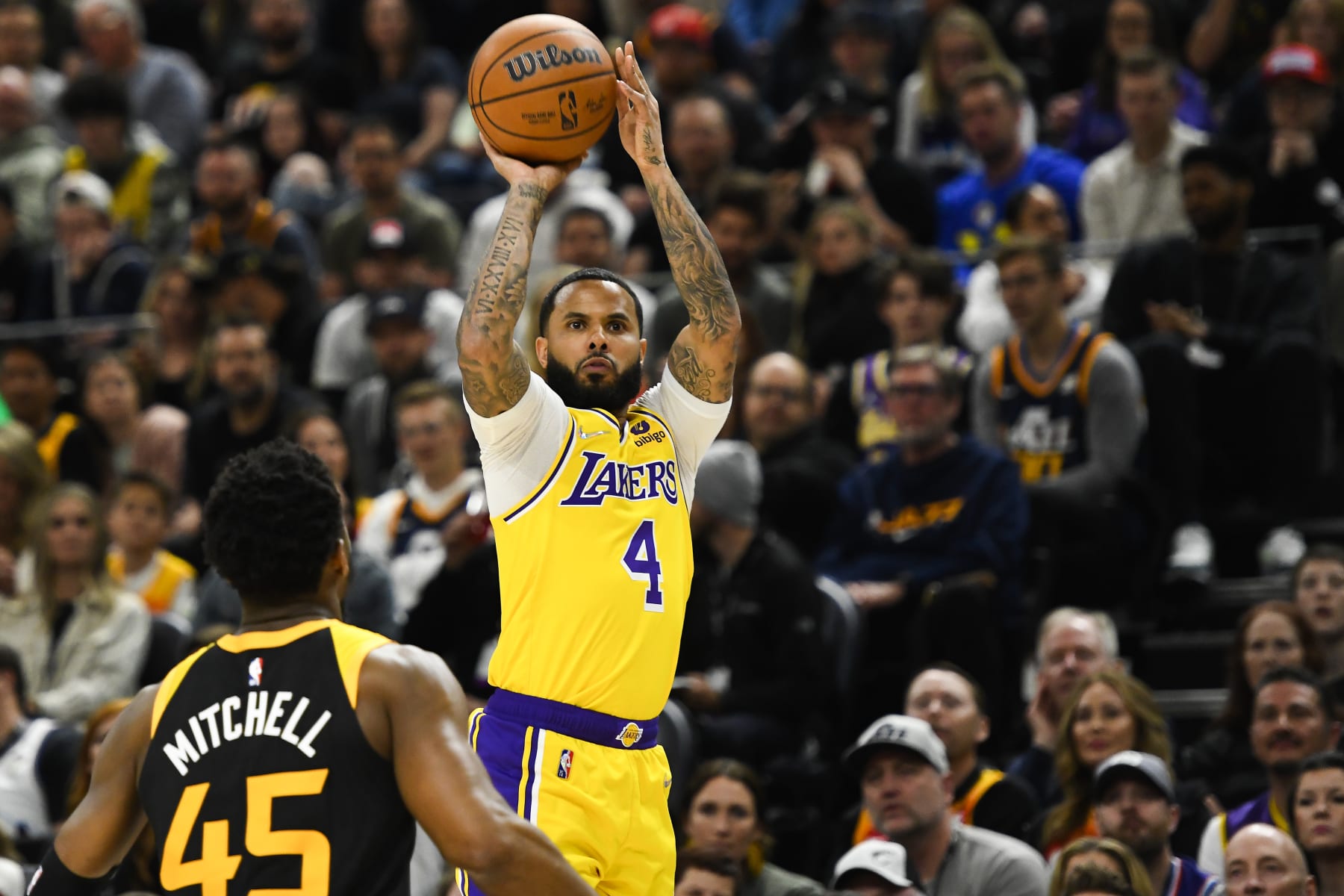 SALT LAKE CITY, UTAH - MARCH 31: D.J. Augustin #4 of the Los Angeles Lakers shoots over Donovan Mitchell #45 of the Utah Jazz during the first half at Vivint Smart Home Arena on March 31, 2022 in Salt Lake City, Utah. NOTE TO USER: User expressly acknowledges and agrees that, by downloading and or using this photograph, User is consenting to the terms and conditions of the Getty Images License Agreement. (Photo by Alex Goodlett/Getty Images)