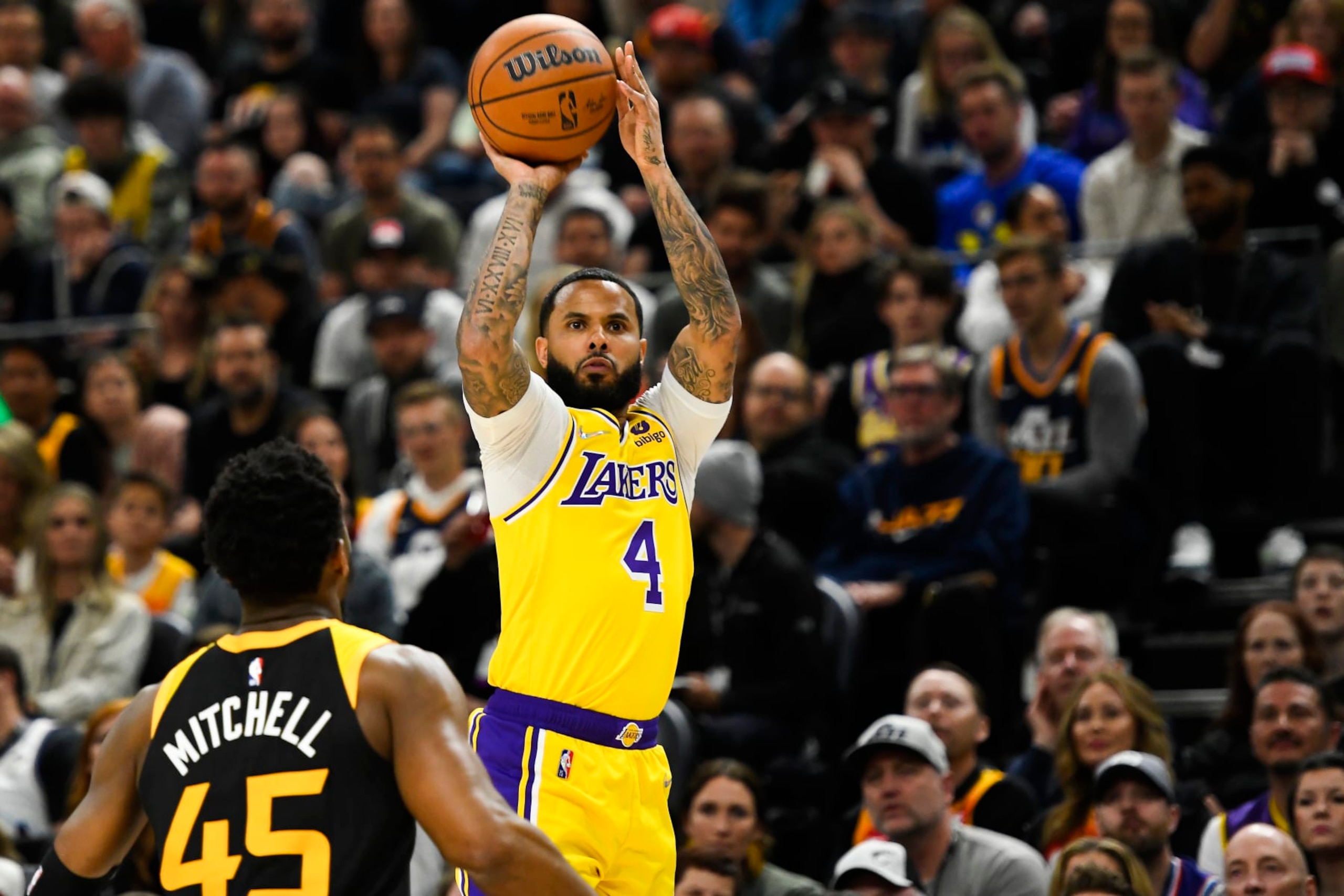 SALT LAKE CITY, UTAH - MARCH 31: D.J. Augustin #4 of the Los Angeles Lakers shoots over Donovan Mitchell #45 of the Utah Jazz during the first half at Vivint Smart Home Arena on March 31, 2022 in Salt Lake City, Utah. NOTE TO USER: User expressly acknowledges and agrees that, by downloading and or using this photograph, User is consenting to the terms and conditions of the Getty Images License Agreement. (Photo by Alex Goodlett/Getty Images) SALT LAKE CITY, UTAH - MARCH 31: D.J. Augustin #4 of the Los Angeles Lakers shoots over Donovan Mitchell #45 of the Utah Jazz during the first half at Vivint Smart Home Arena on March 31, 2022 in Salt Lake City, Utah. NOTE TO USER: User expressly acknowledges and agrees that, by downloading and or using this photograph, User is consenting to the terms and conditions of the Getty Images License Agreement. (Photo by Alex Goodlett/Getty Images)