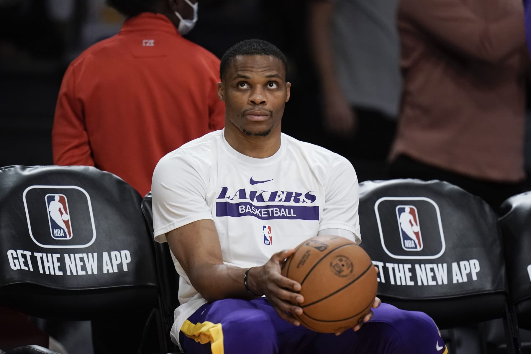 Los Angeles Lakers' Russell Westbrook sits on the bench before the team's NBA preseason basketball game against the Minnesota Timberwolves Wednesday, Oct. 12, 2022, in Los Angeles. (AP Photo/Jae C. Hong)