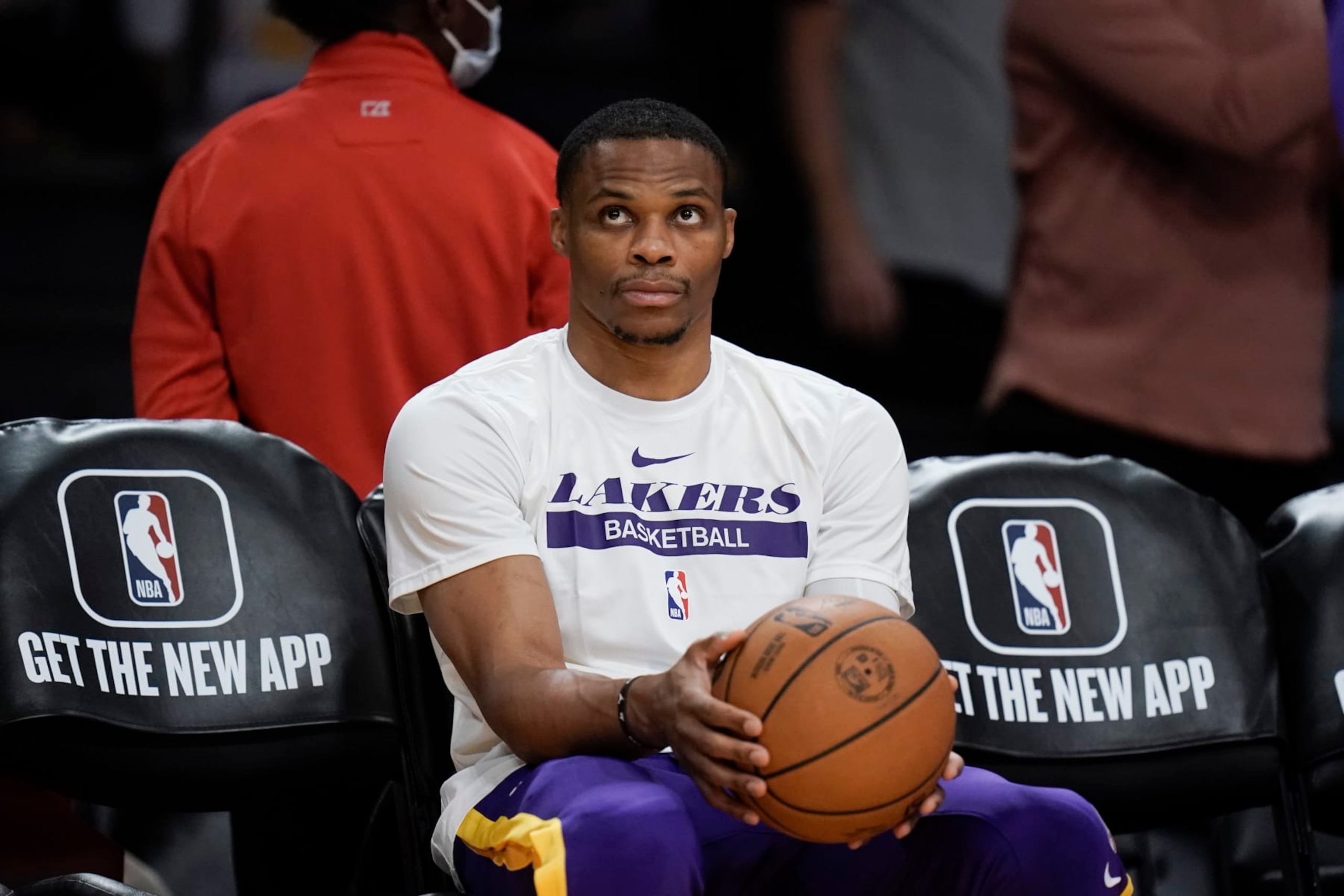 Los Angeles Lakers' Russell Westbrook sits on the bench before the team's NBA preseason basketball game against the Minnesota Timberwolves Wednesday, Oct. 12, 2022, in Los Angeles. (AP Photo/Jae C. Hong)
