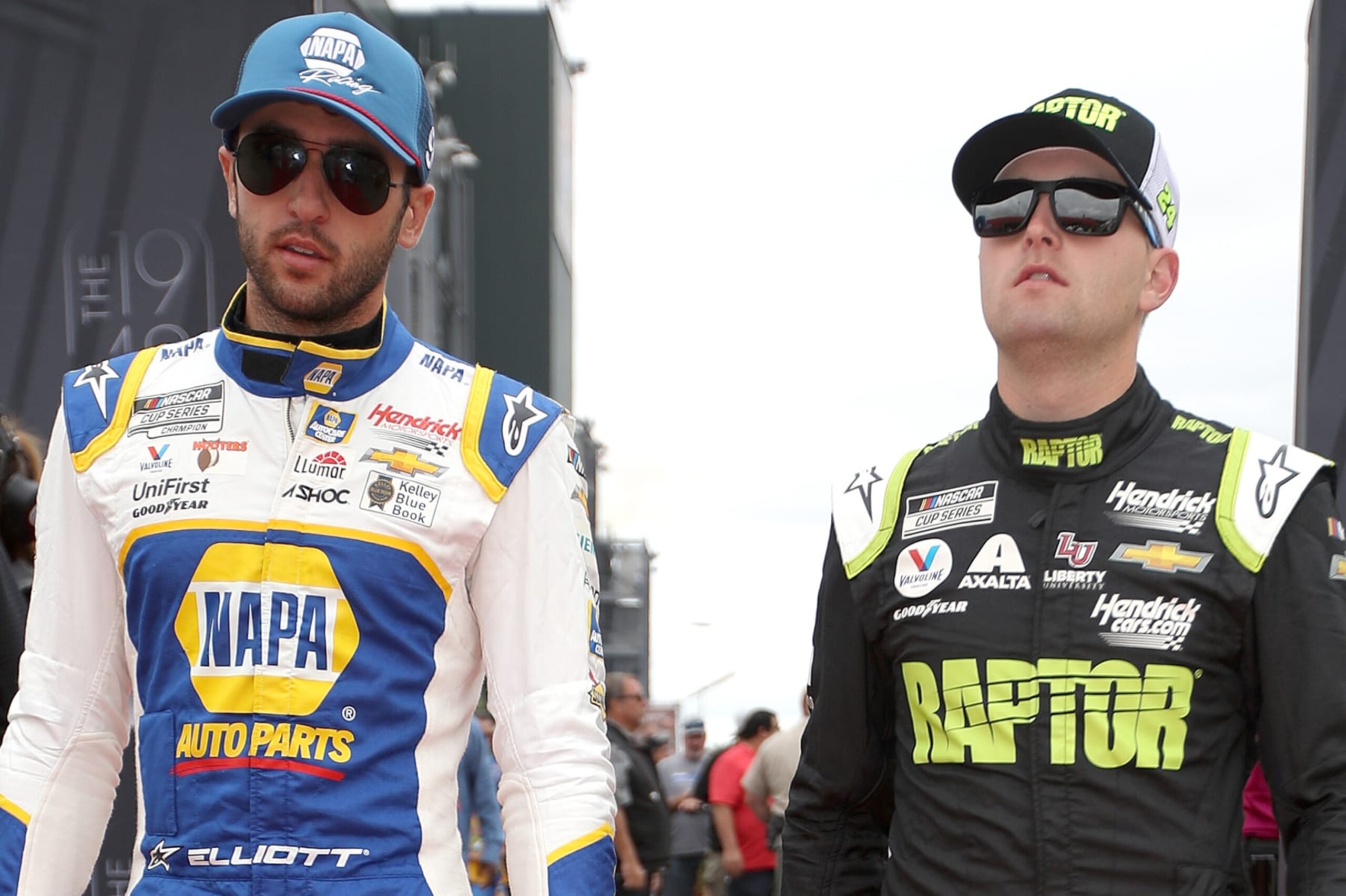 SONOMA, CALIFORNIA - JUNE 12: Chase Elliott, driver of the #9 NAPA Auto Parts Chevrolet, (L) and William Byron, driver of the #24 RaptorTough.com Chevrolet, walk the red carpet prior to the NASCAR Cup Series Toyota/Save Mart 350 at Sonoma Raceway on June 12, 2022 in Sonoma, California. (Photo by Sean Gardner/Getty Images)