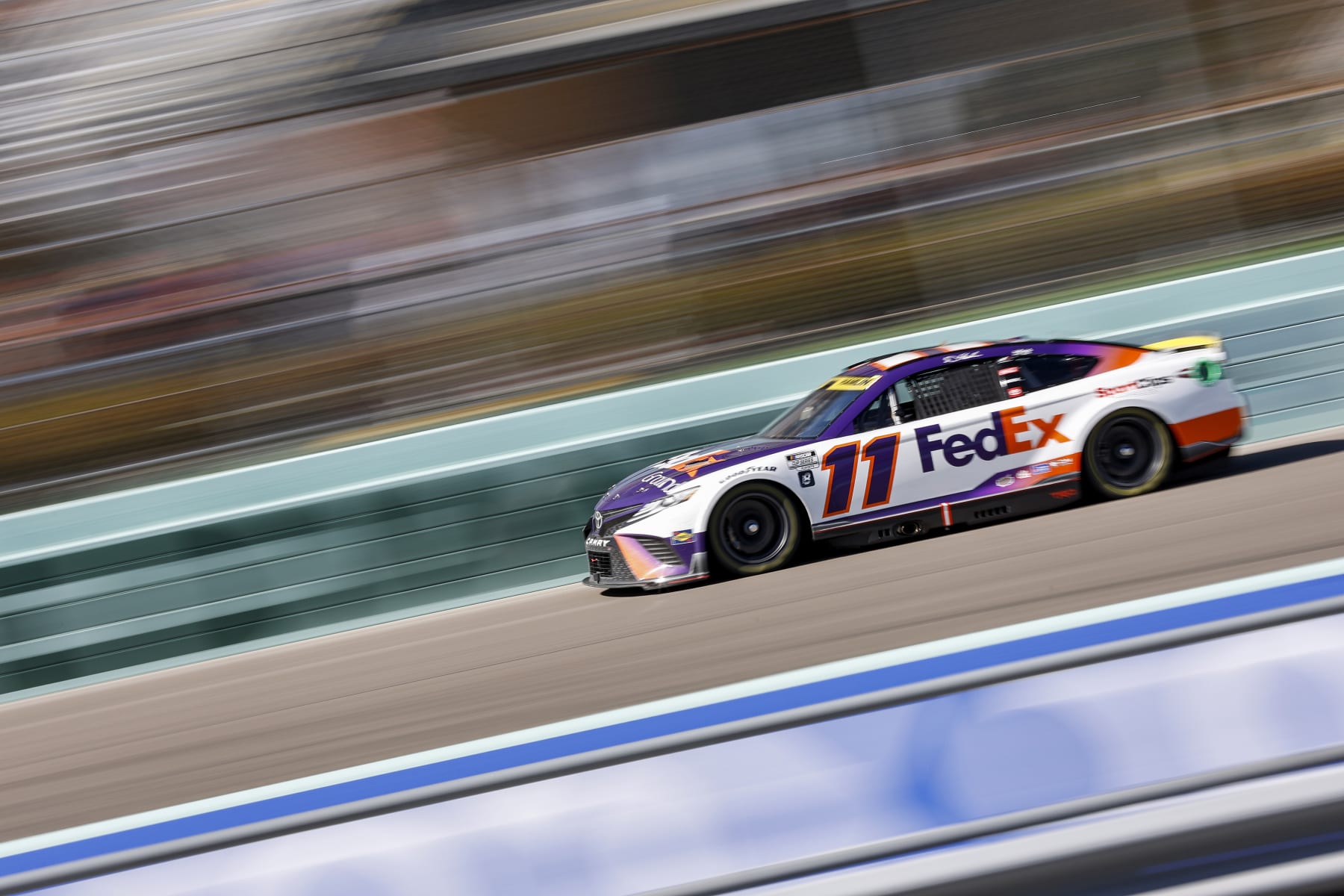HOMESTEAD, FLORIDA - OCTOBER 23: Denny Hamlin, driver of the #11 FedEx Ground Toyota, drives during the NASCAR Cup Series Dixie Vodka 400 at Homestead-Miami Speedway on October 23, 2022 in Homestead, Florida. (Photo by Sean Gardner/Getty Images)