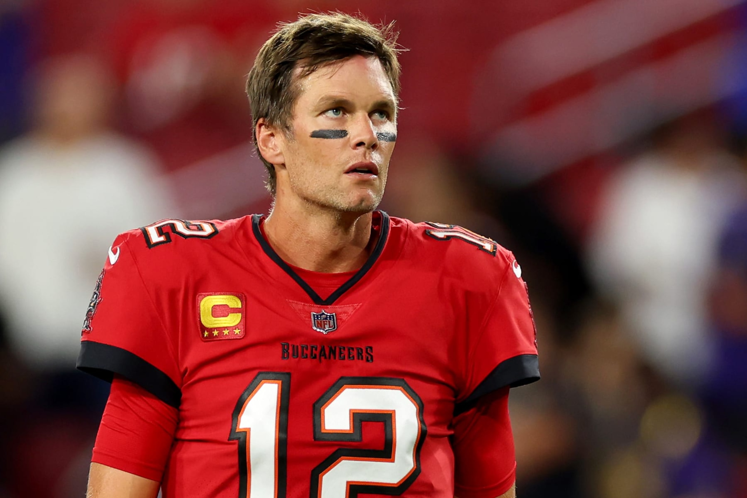 TAMPA, FLORIDA - OCTOBER 27: Tom Brady #12 of the Tampa Bay Buccaneers looks on during pregame warm-ups prior to a game against the Baltimore Ravens at Raymond James Stadium on October 27, 2022 in Tampa, Florida. (Photo by Mike Ehrmann/Getty Images)