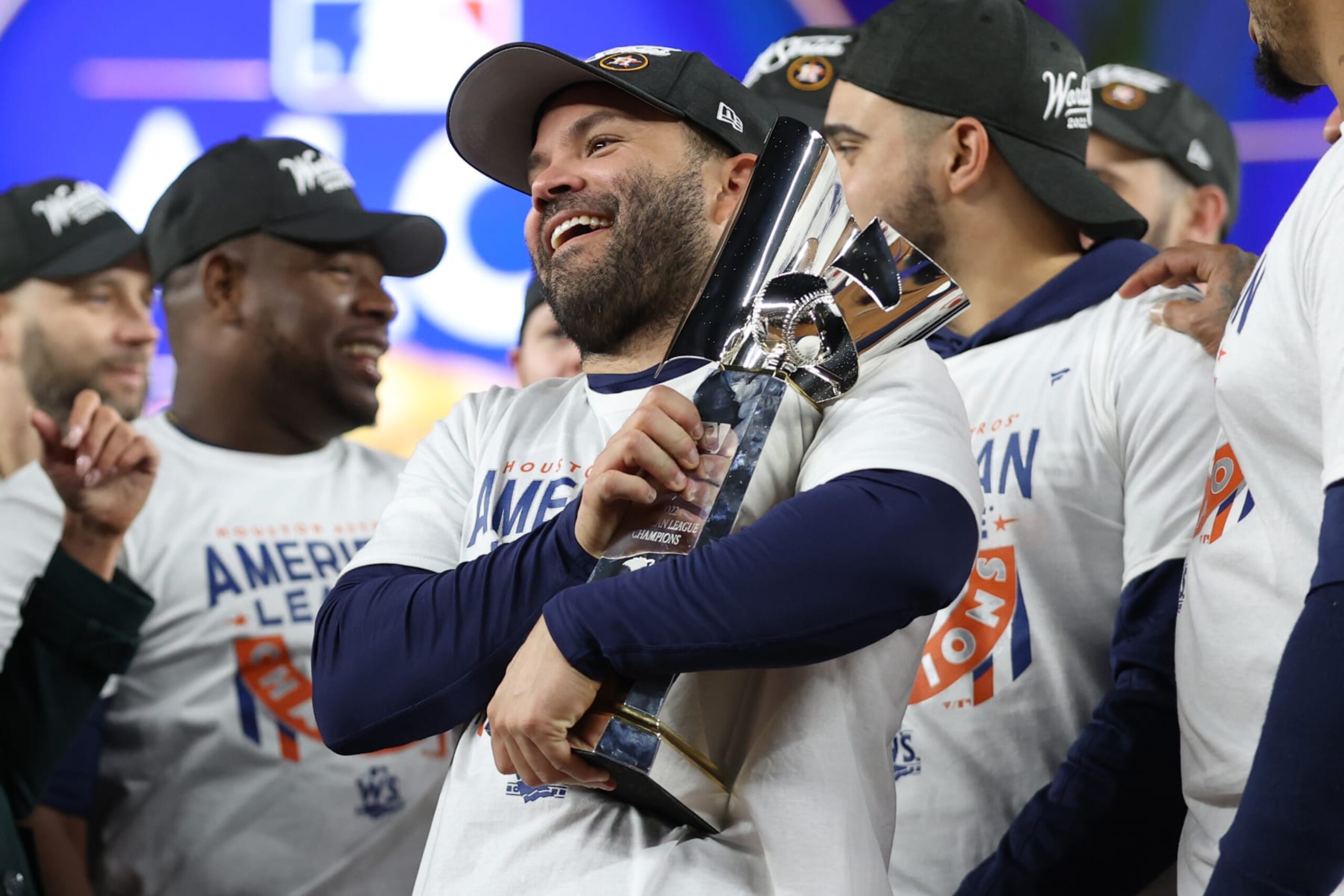 NEW YORK, NEW YORK - OCTOBER 23: Jose Altuve #27 of the Houston Astros celebrates with the American League Championship Series trophy after winning game four against the New York Yankees to advance to the World Series at Yankee Stadium on October 23, 2022 in the Bronx borough of New York City. (Photo by Elsa/Getty Images)