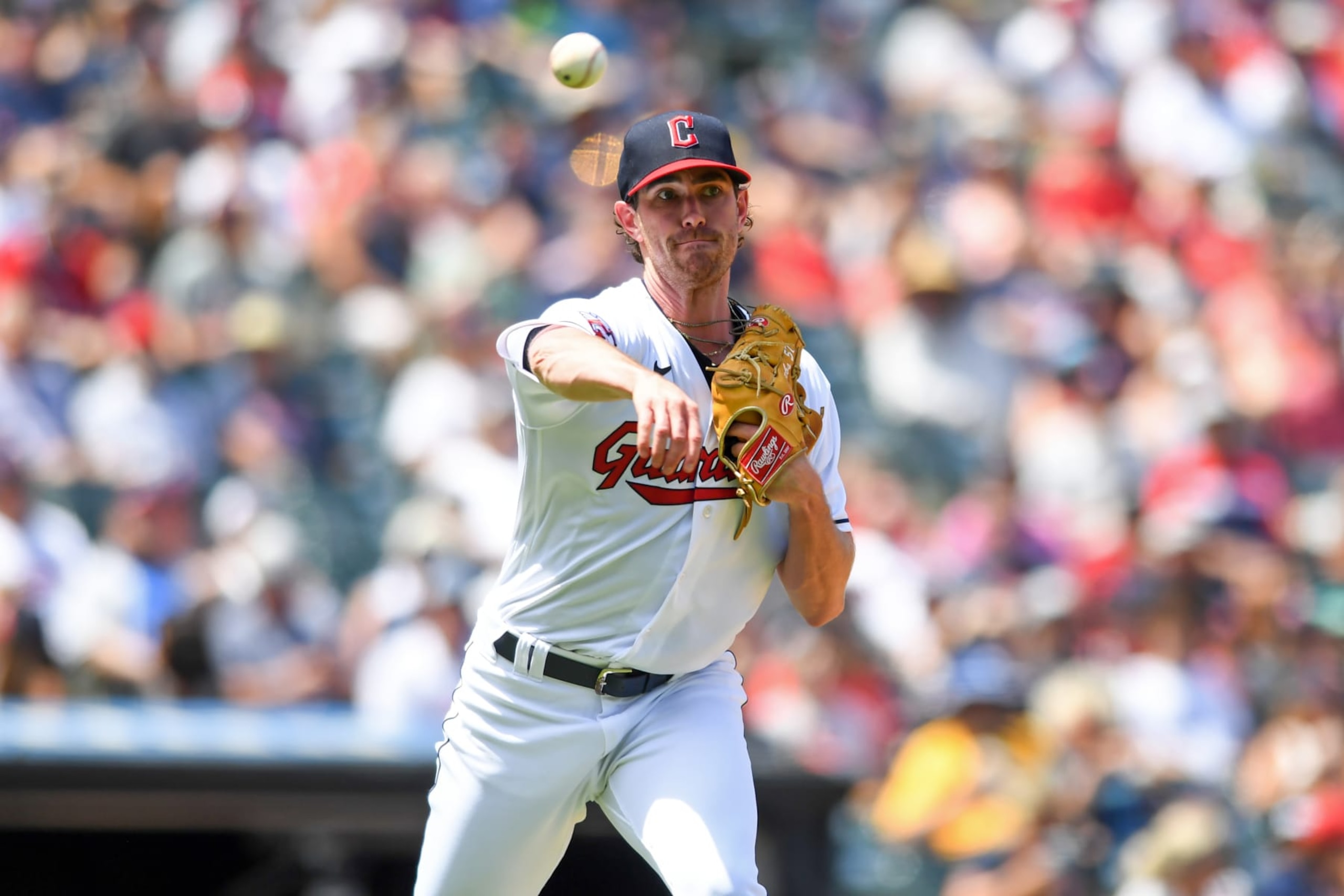 CLEVELAND, OH - AUGUST 03, 2022: Shane Bieber #57 of the Cleveland Guardians throws out Christian Walker of the Arizona Diamondbacks at first base during the second inning at Progressive Field on August 3, 2022 in Cleveland, Ohio. (Photo by Nick Cammett/Diamond Images via Getty Images)
