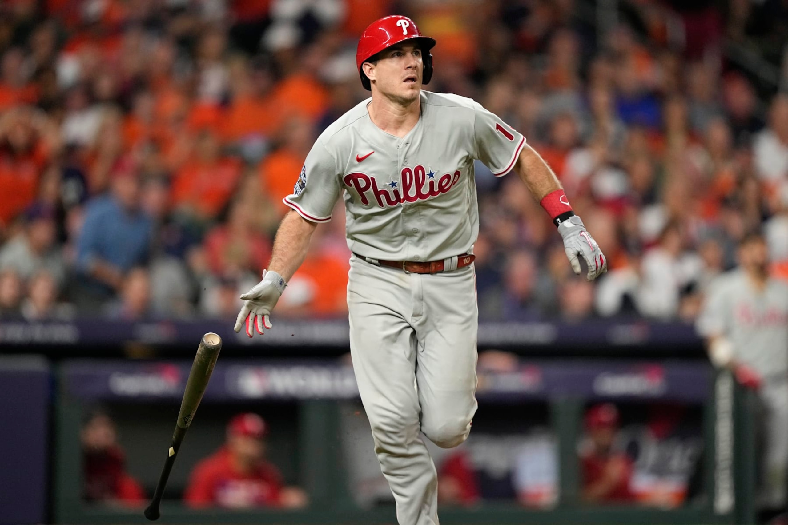 Philadelphia Phillies' J.T. Realmuto watches his solo homer during the 10th inning in Game 1 of baseball's World Series between the Houston Astros and the Philadelphia Phillies on Friday, Oct. 28, 2022, in Houston. (AP Photo/David J. Phillip) Philadelphia Phillies' J.T. Realmuto watches his solo homer during the 10th inning in Game 1 of baseball's World Series between the Houston Astros and the Philadelphia Phillies on Friday, Oct. 28, 2022, in Houston. (AP Photo/David J. Phillip)