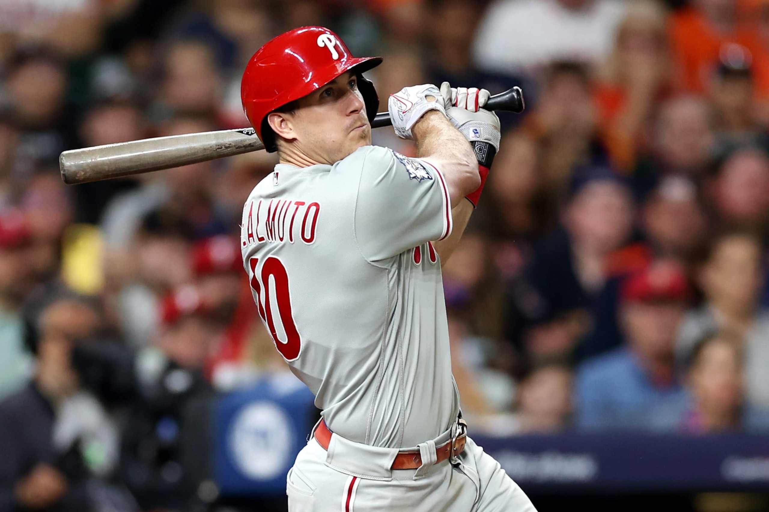 HOUSTON, TEXAS - OCTOBER 28: J.T. Realmuto #10 of the Philadelphia Phillies hits a home run in the 10th inning against the Houston Astros in Game One of the 2022 World Series at Minute Maid Park on October 28, 2022 in Houston, Texas. (Photo by Sean M. Haffey/Getty Images) HOUSTON, TEXAS - OCTOBER 28: J.T. Realmuto #10 of the Philadelphia Phillies hits a home run in the 10th inning against the Houston Astros in Game One of the 2022 World Series at Minute Maid Park on October 28, 2022 in Houston, Texas. (Photo by Sean M. Haffey/Getty Images)
