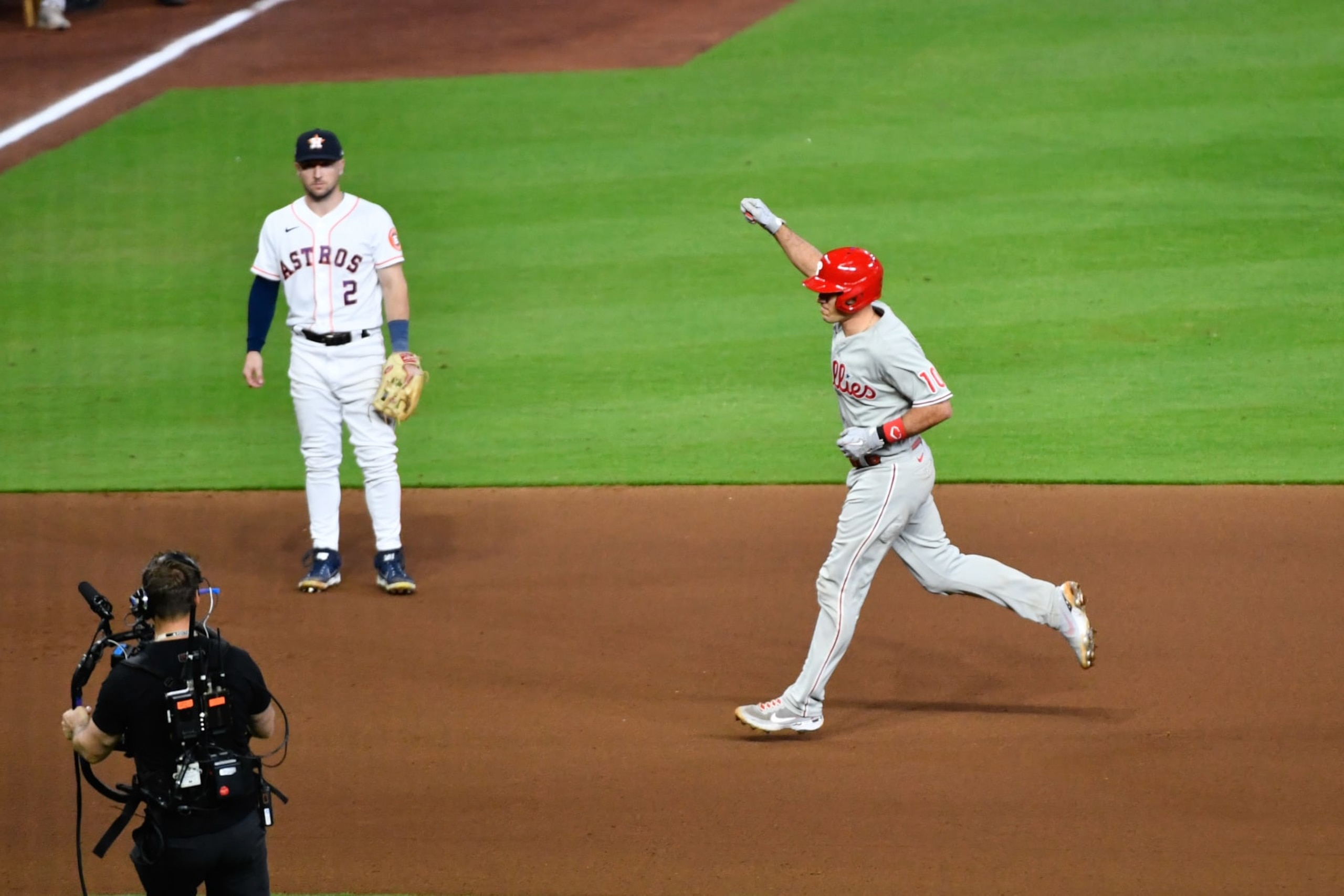 HOUSTON, TX - OCTOBER 28:   J.T. Realmuto #10 of the Philadelphia Phillies reacts after hitting a home run in the tenth inning to take the lead during Game 1 of the 2022 World Series between the Philadelphia Phillies and the Houston Astros at Minute Maid Park on Friday, October 28, 2022 in Houston, Texas. (Photo by Logan Riely/MLB Photos via Getty Images)