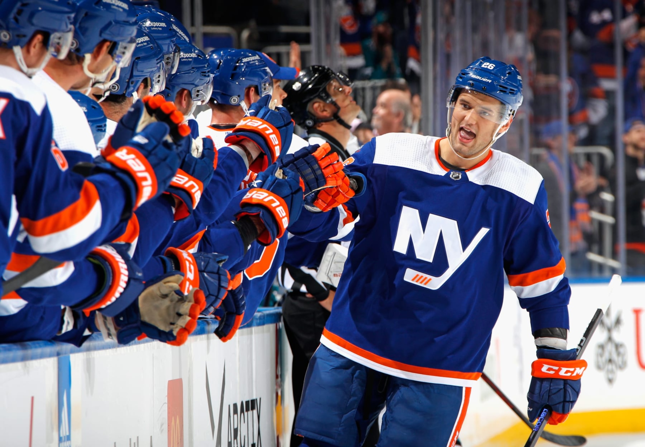 ELMONT, NEW YORK - OCTOBER 18: Oliver Wahlstrom #26 of the New York Islanders celebrates his second goal of the game against the San Jose Sharks at UBS Arena on October 18, 2022 in Elmont, New York. (Photo by Bruce Bennett/Getty Images)