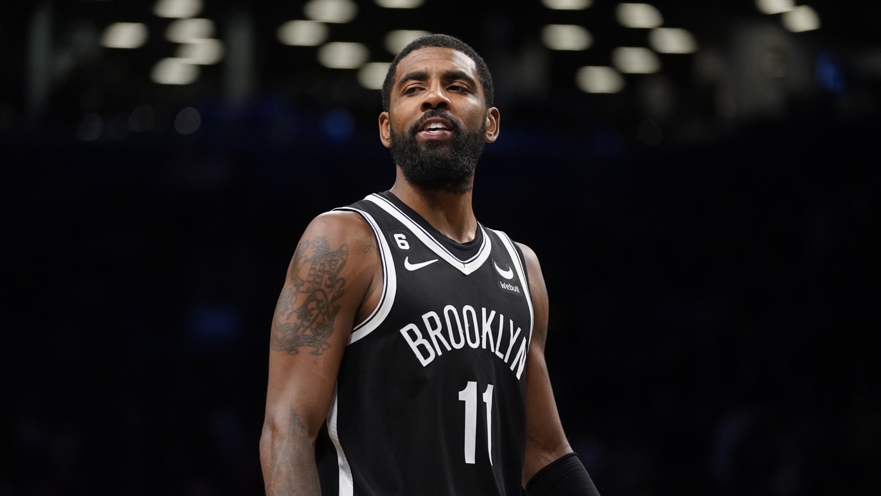 Brooklyn Nets guard Kyrie Irving (11) reacts during overtime of an NBA basketball game against the Dallas Mavericks, Thursday, Oct. 27, 2022, in New York. (AP Photo/John Minchillo)