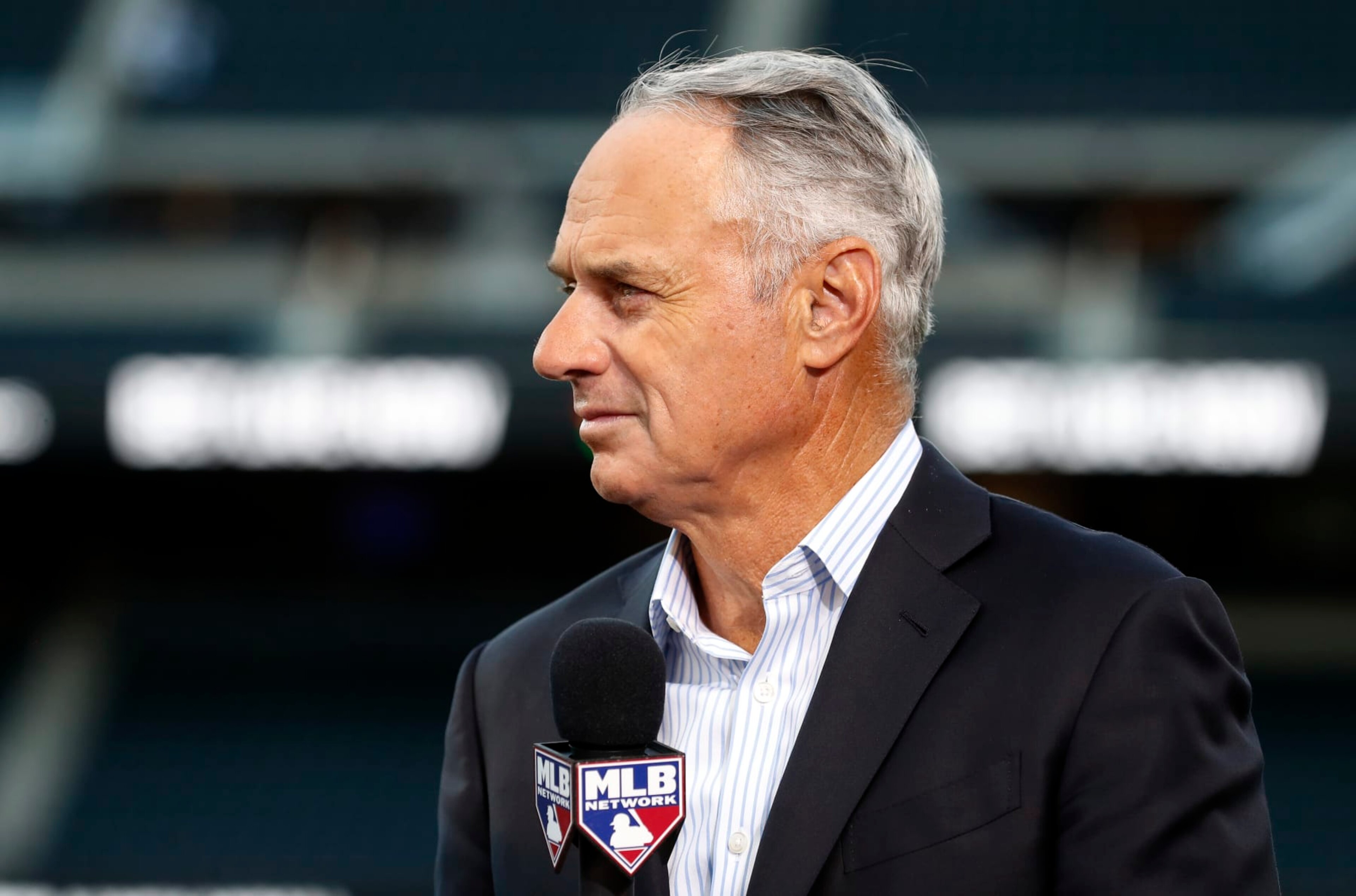 NEW YORK, NEW YORK - SEPTEMBER 15:  MLB Commissioner Rob Manfred attends Roberto Clemente Day at Citi Field before a game between the New York Mets and the Pittsburgh Pirates on September 15, 2022 in New York City. Players are wearing number 21 in honor of Roberto Clemente Day. The Mets defeated the Pirates 7-1.  (Photo by Jim McIsaac/Getty Images)
