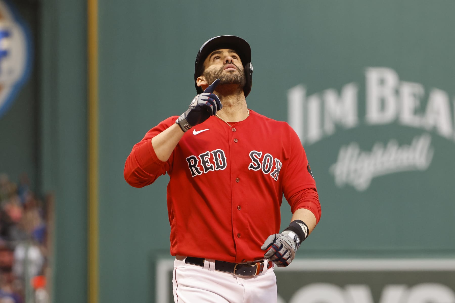 BOSTON, MA - OCTOBER 5: J.D. Martinez #28 of the Boston Red Sox points skyward after his three-run home run against the Tampa Bay Rays during the first inning at Fenway Park on October 5, 2022 in Boston, Massachusetts. (Photo By Winslow Townson/Getty Images)