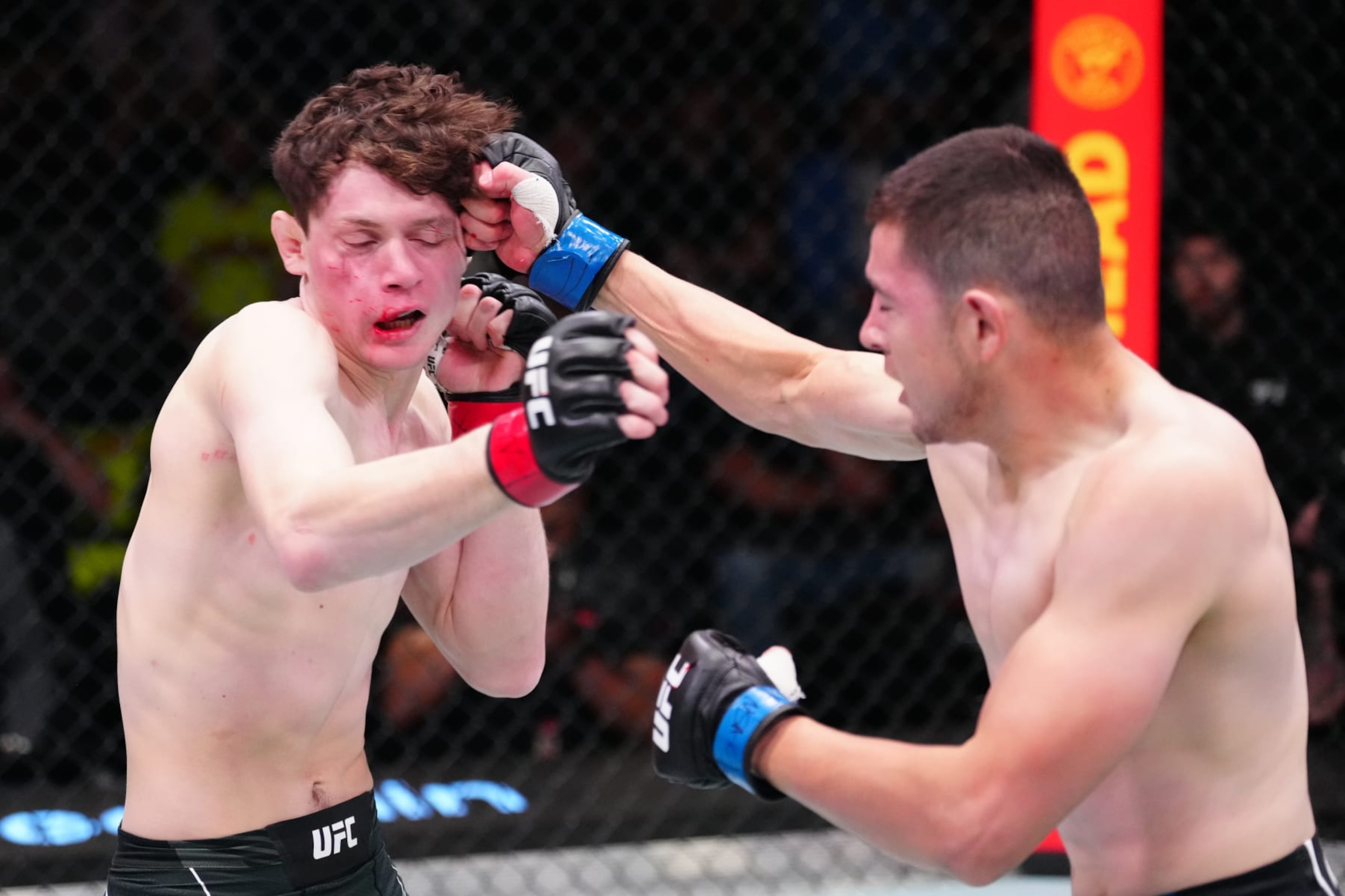 Steve Garcia punches Chase Hooper. Steve Garcia punches Chase Hooper.