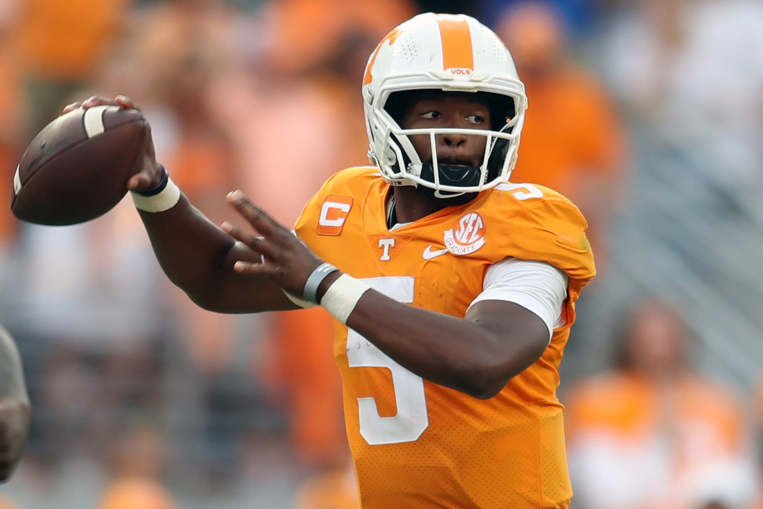 KNOXVILLE, TENNESSEE - SEPTEMBER 24: Hendon Hooker #5 of the Tennessee Volunteers looks to throw against the Florida Gators at Neyland Stadium on September 24, 2022 in Knoxville, Tennessee. Tennessee won the game 38-33. (Photo by Donald Page/Getty Images)